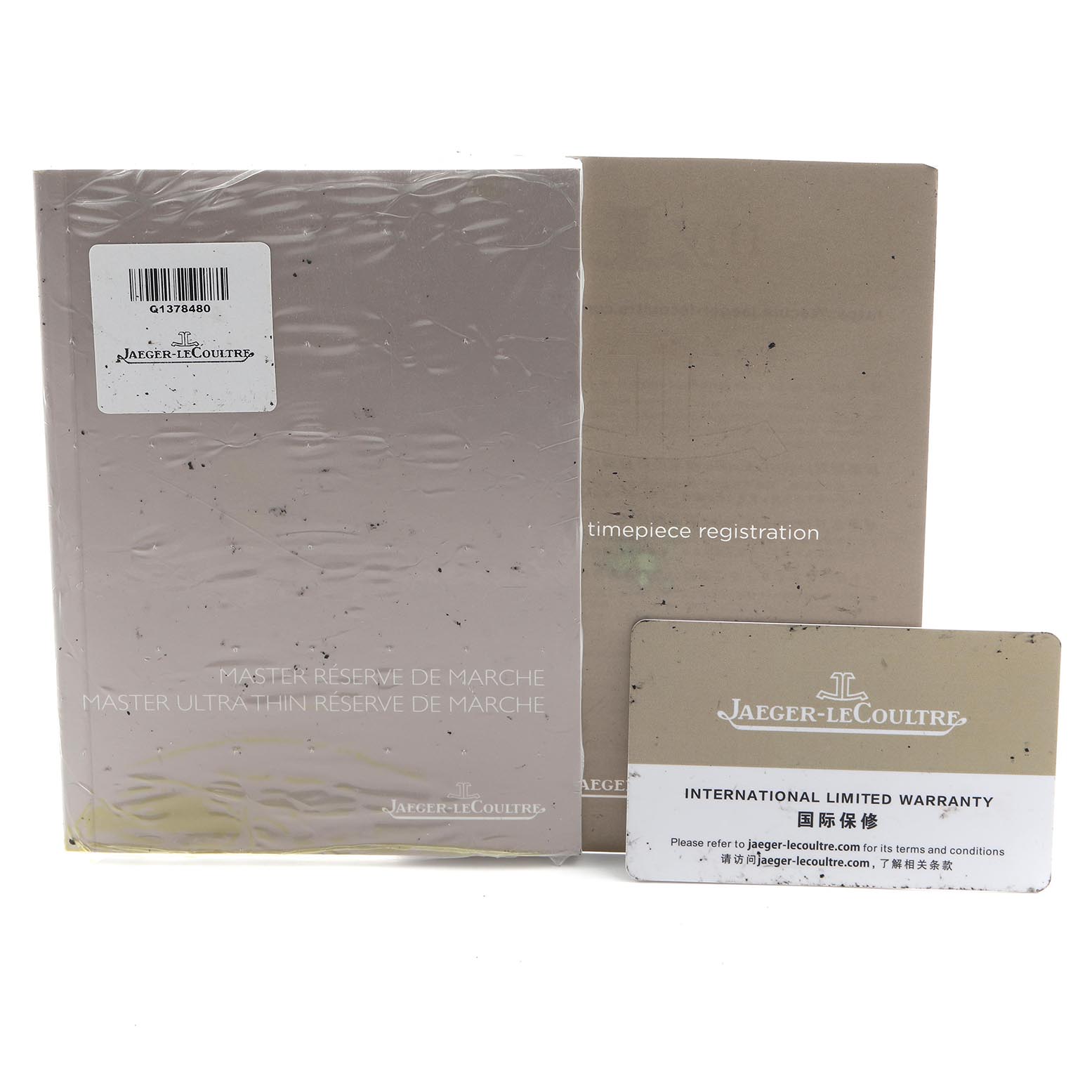 The image shows warranty cards and manuals for Jaeger LeCoultre
s Master model at a front angle.