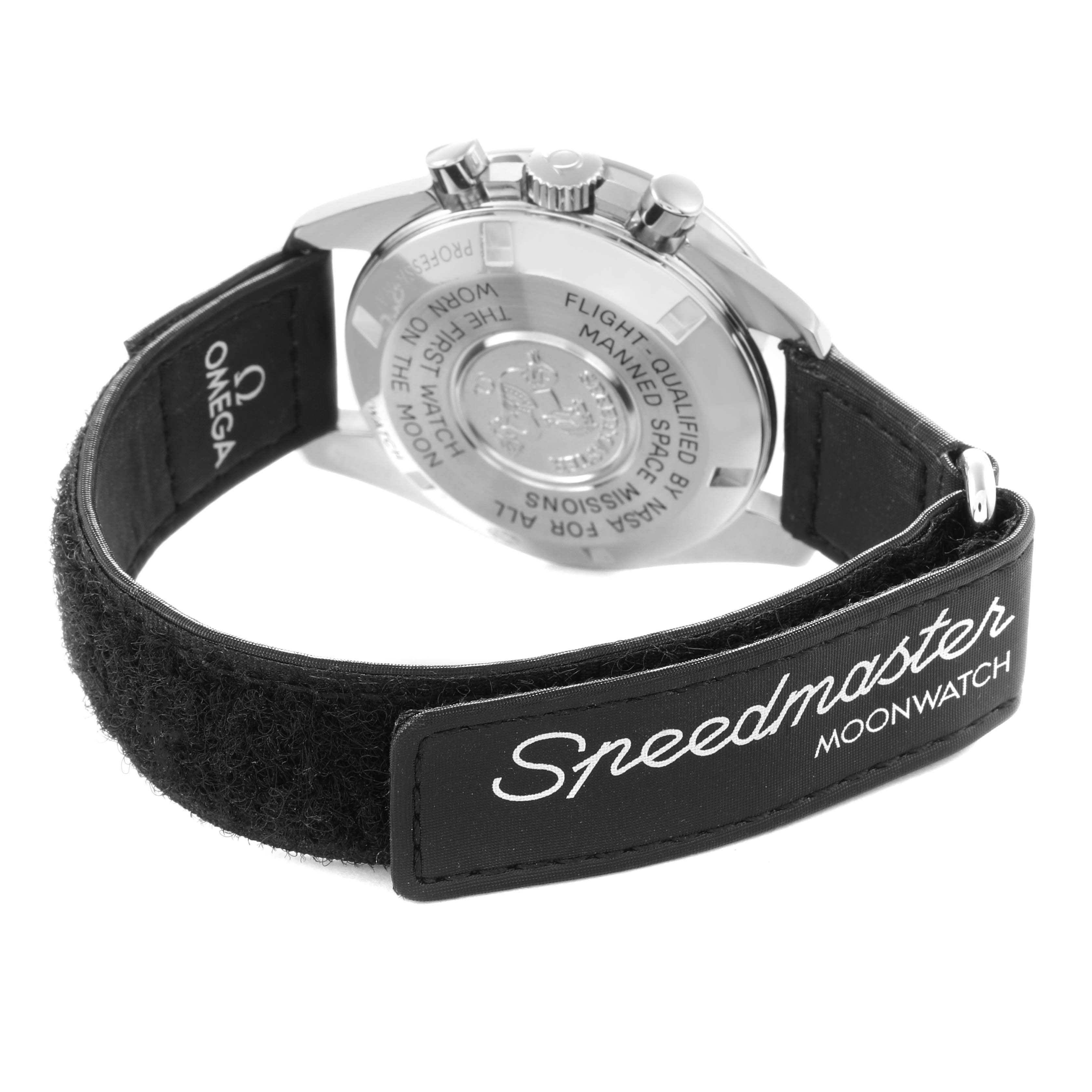 The image shows the back of an Omega Speedmaster 311.33.42.30.01.001 Men's Stainless Steel Black Dial 311.33.42.30.01.001 Men's Stainless Steel Black Dial watch and a Velcro strap with the "Speedmaster" logo.