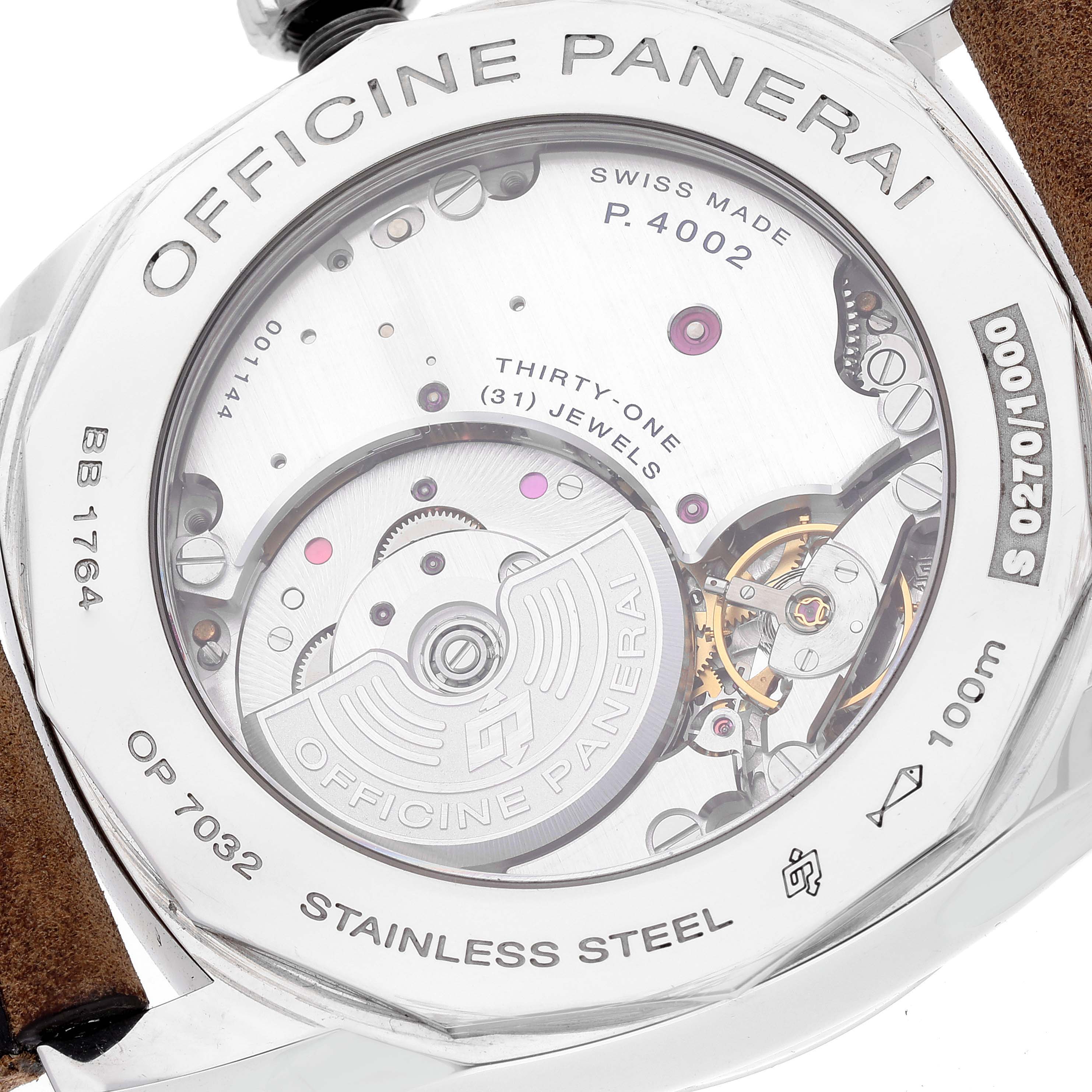 The image shows the back view of a Panerai Radiomir PAM00658 Men's Stainless Steel Black Dial PAM00658 Men's Stainless Steel Black Dial watch, highlighting its internal mechanism and "Officine Panerai" engravings.