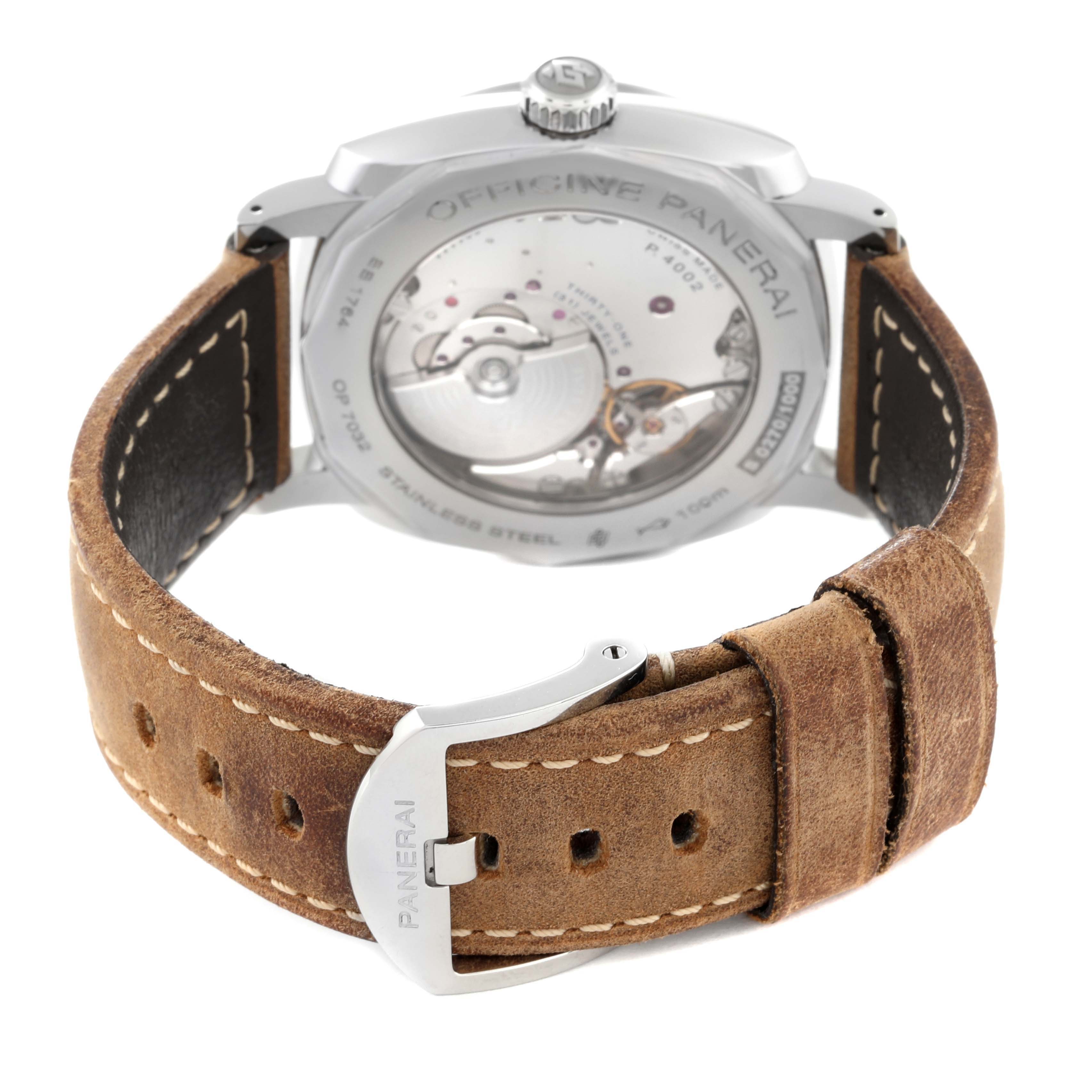 The image shows the case back and brown leather strap with buckle of the Radiomir model by Panerai, highlighting the movement and branding.