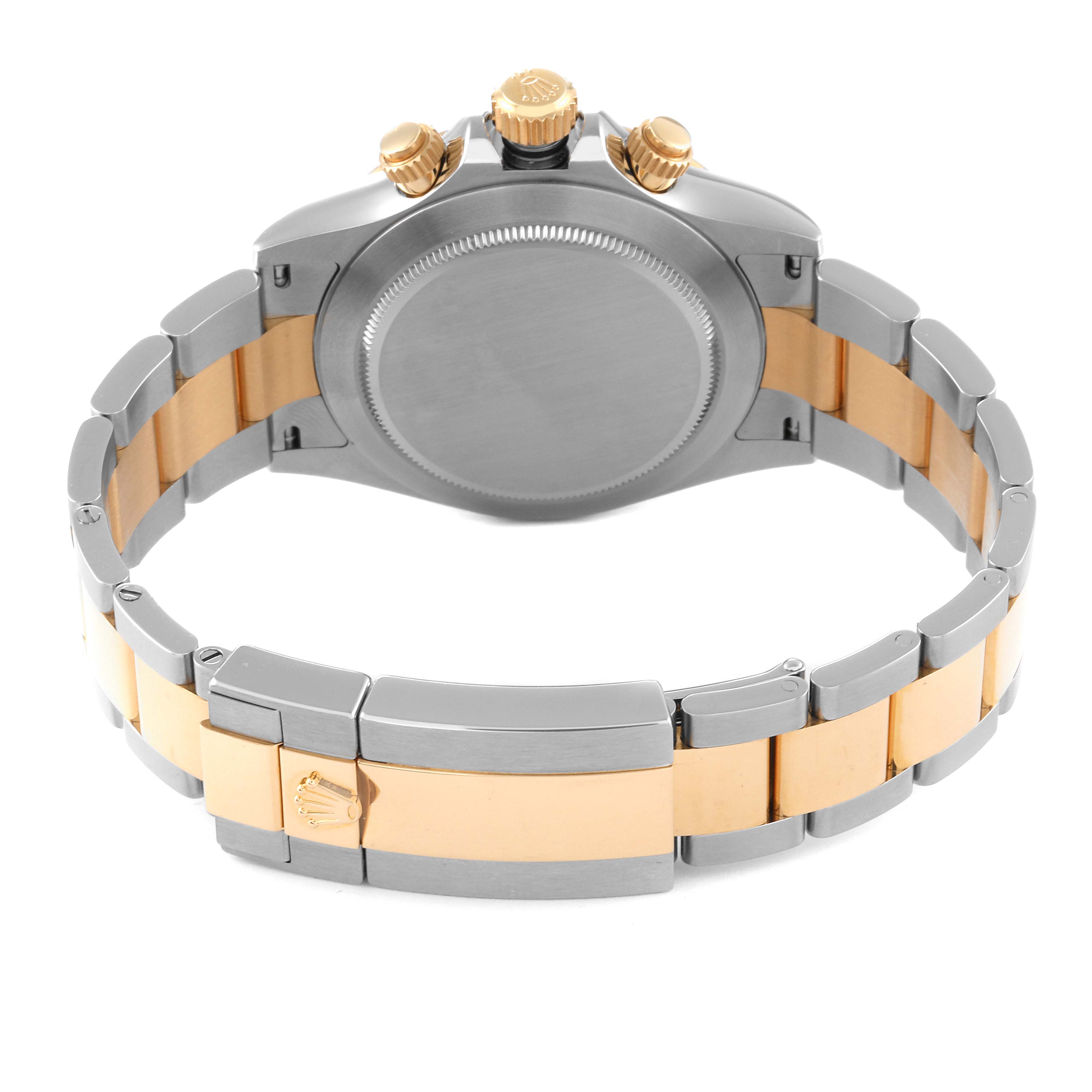 This image shows the back view of the Rolex Daytona 116503 Men
s Steel and Gold (two tone) Black Dial 116503 Men
s Steel and Gold (two tone) Black Dial, highlighting its bracelet, clasp, and case back.