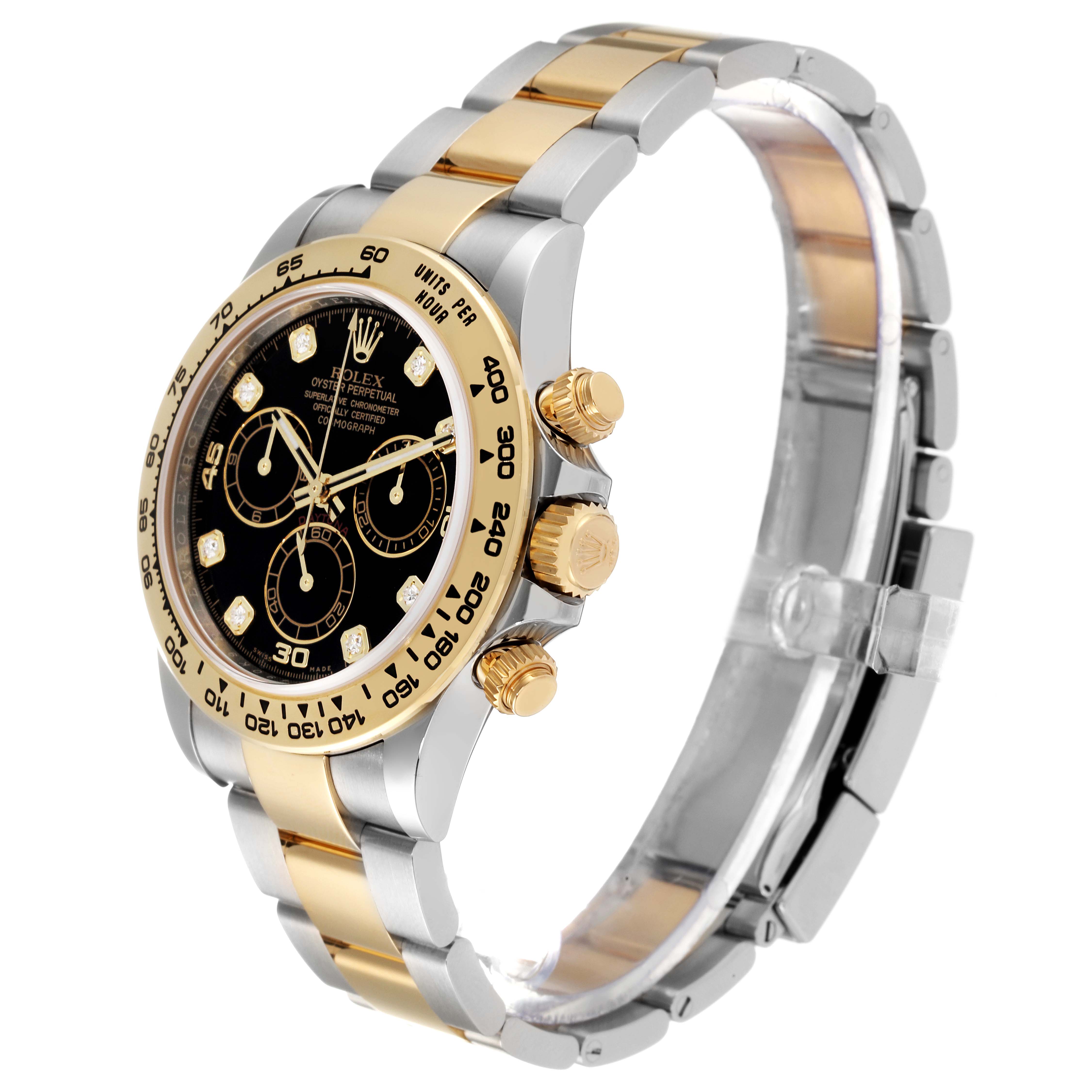 This image shows a side angle of a Rolex Daytona 116503 Men
s Steel and Gold (two tone) Black Dial 116503 Men
s Steel and Gold (two tone) Black Dial watch, highlighting the gold bezel, black dial, and two-tone metal bracelet.