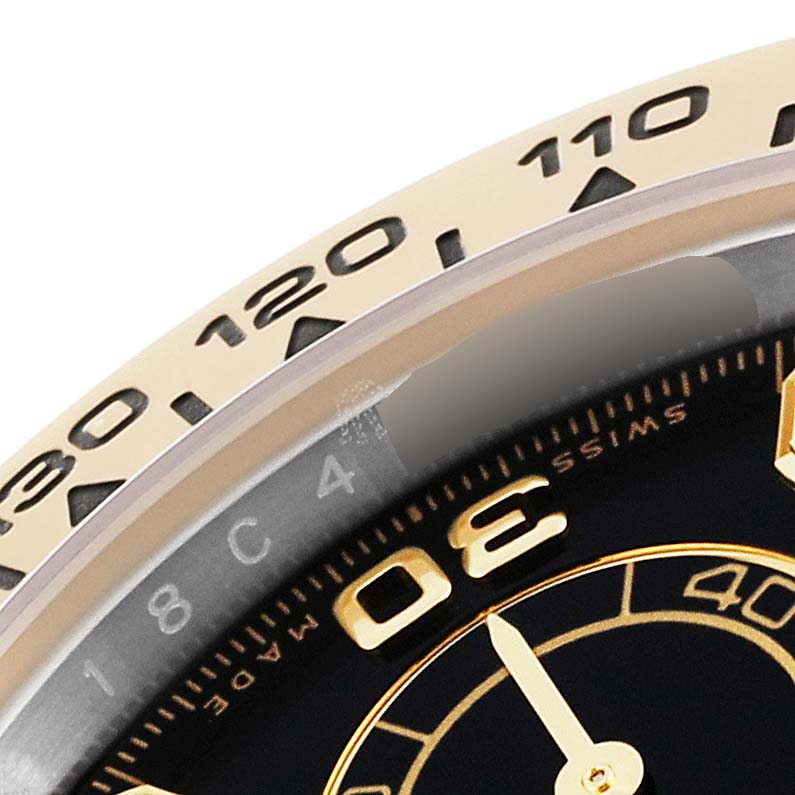This image shows a close-up of the dial and tachymeter bezel of a Rolex Daytona 116503 Men
s Steel and Gold (two tone) Black Dial 116503 Men
s Steel and Gold (two tone) Black Dial watch.