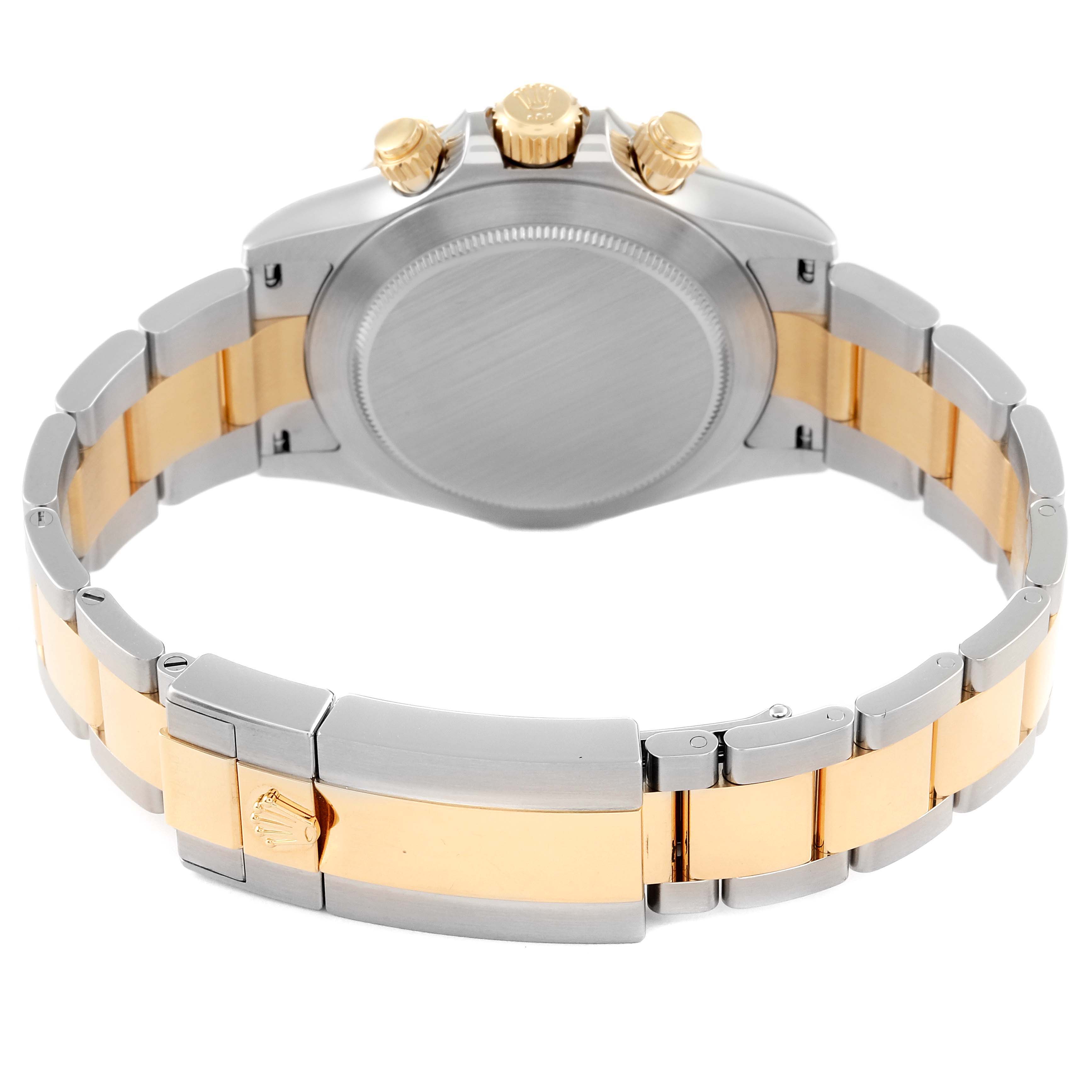 The image shows the back view of a Rolex Daytona 116503 Men
s Steel and Gold (two tone) Black Dial 116503 Men
s Steel and Gold (two tone) Black Dial watch, highlighting the clasp and two-tone bracelet.