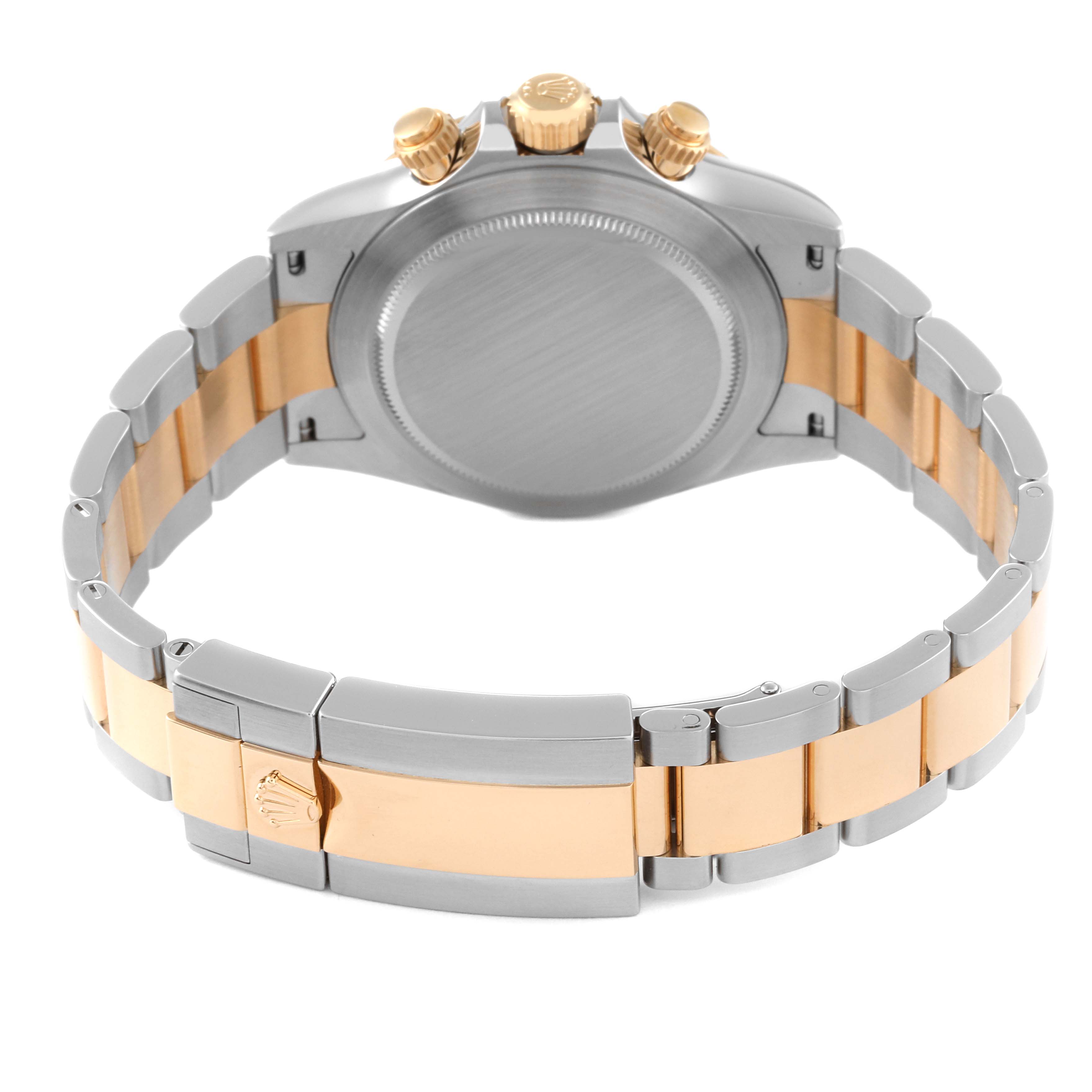 The image shows the back case and bracelet clasp of a Rolex Daytona 116503 Men's Steel and Gold (two tone) Champagne Dial 116503 Men's Steel and Gold (two tone) Champagne Dial watch, displaying a two-tone metal finish.