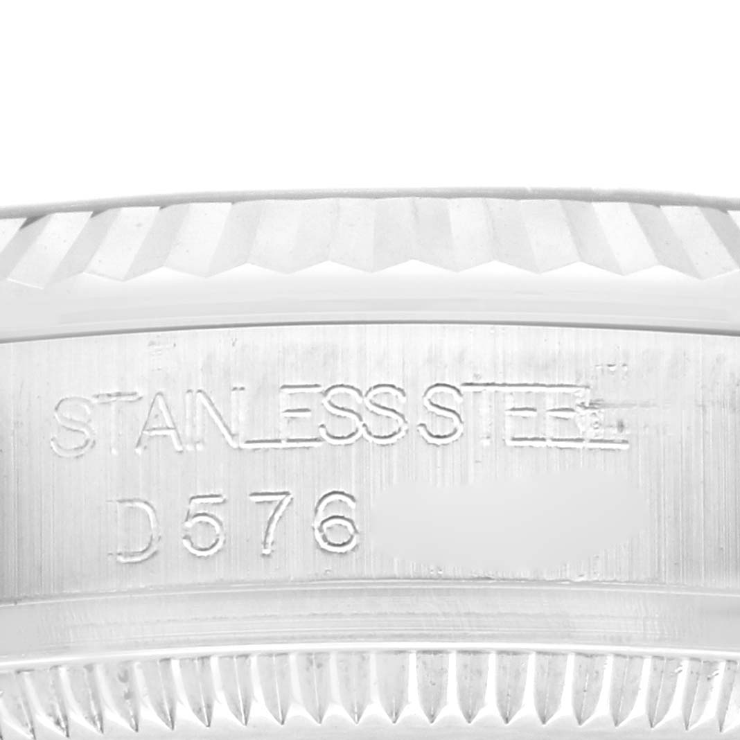 The image shows a close-up side view of the case back edge of a Rolex Mid-Size 178274 Women
s Stainless Steel Black Dial 178274 Women
s Stainless Steel Black Dial model in stainless steel.