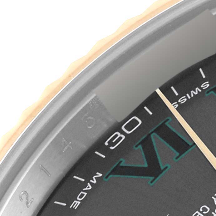 The image shows a close-up view of the dial and bezel of a Rolex Datejust 41 116333 Men's Steel and Gold (two tone) Grey Dial 116333 Men's Steel and Gold (two tone) Grey Dial watch, highlighting the "30" minute marker and part of the Roman numeral "VI."