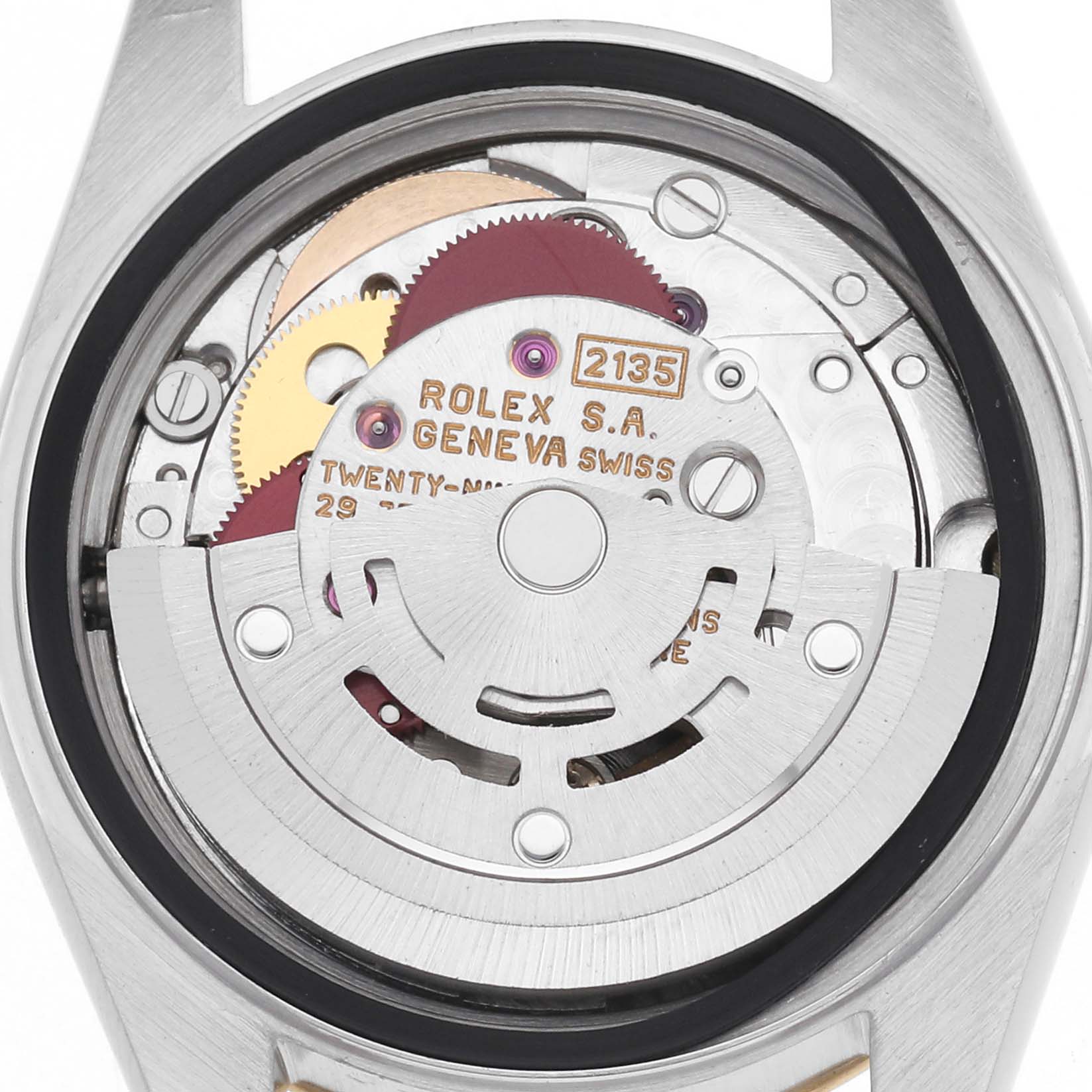 The image shows the movement of a Rolex Datejust 69173 Women
s Steel and Gold (two tone) Red Dial 69173 Women
s Steel and Gold (two tone) Red Dial from a top-down perspective, highlighting gears and engravings.