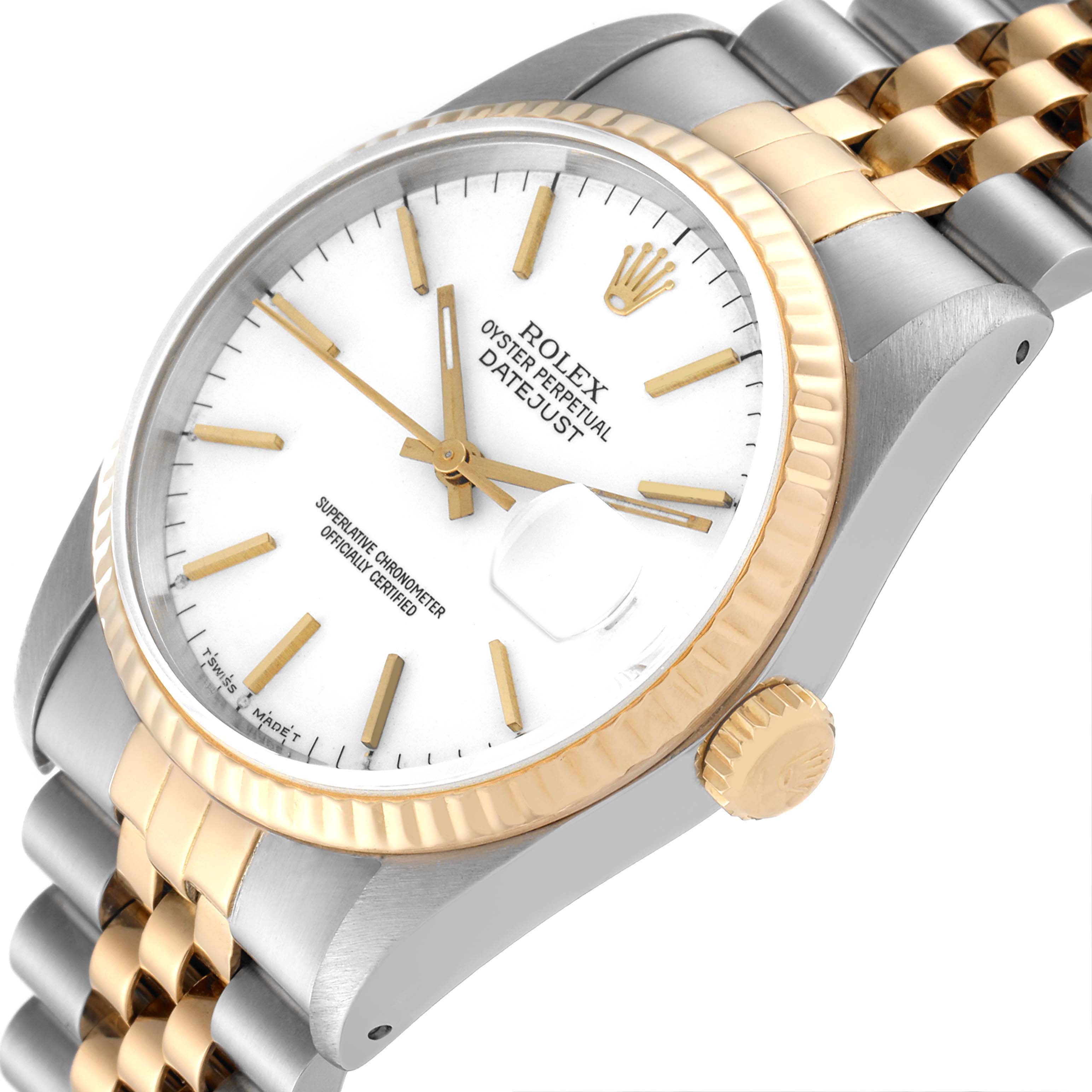 This image shows a close-up angled view of the Rolex Datejust 16233 Men's Steel and Gold (two tone) White Dial 16233 Men's Steel and Gold (two tone) White Dial watch, highlighting the face, bezel, and part of the bracelet.