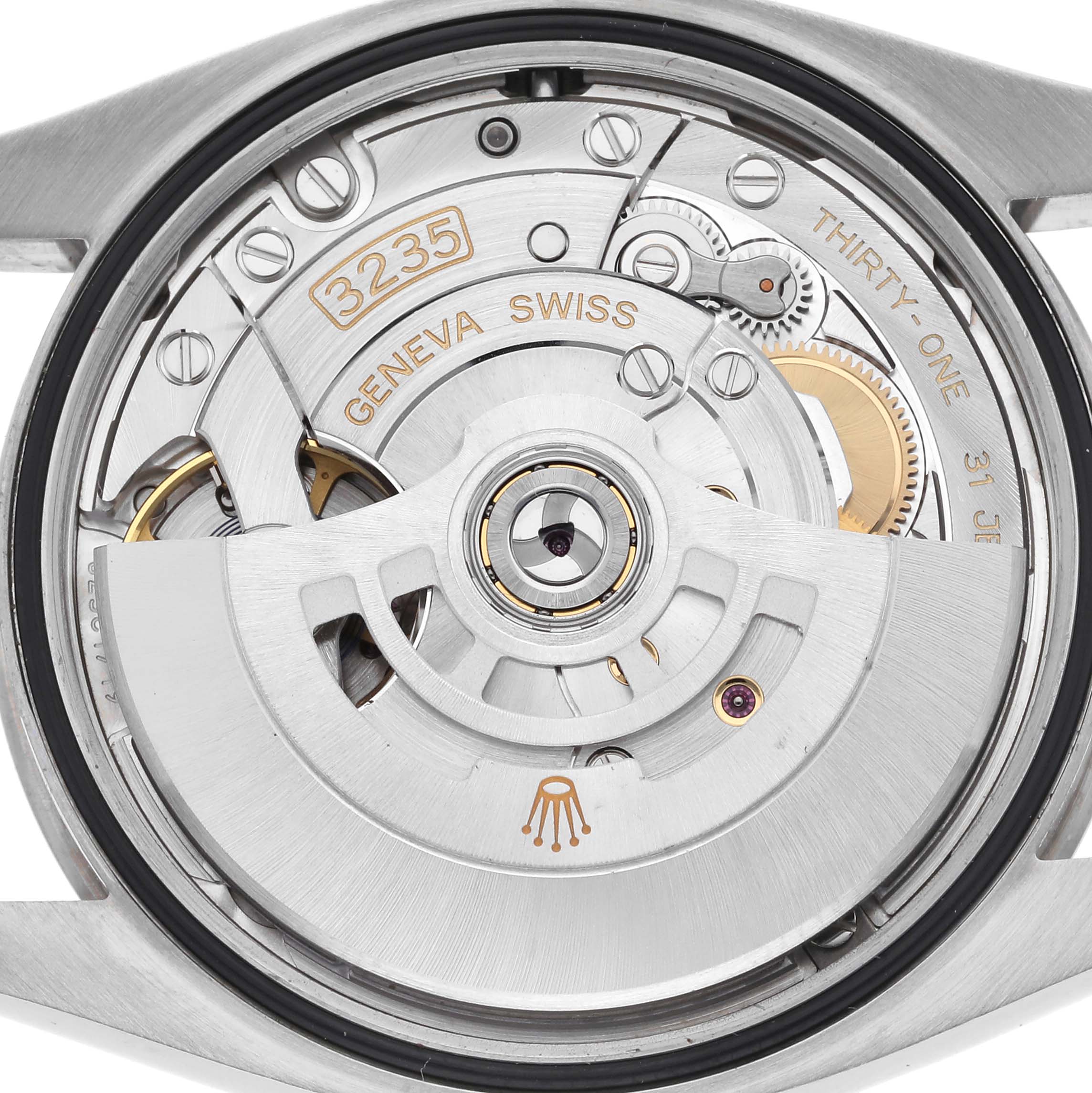 This image shows the internal movement of a Rolex Datejust 126234 Men's Stainless Steel White Dial 126234 Men's Stainless Steel White Dial, highlighting the intricate gears and rotor mechanism.