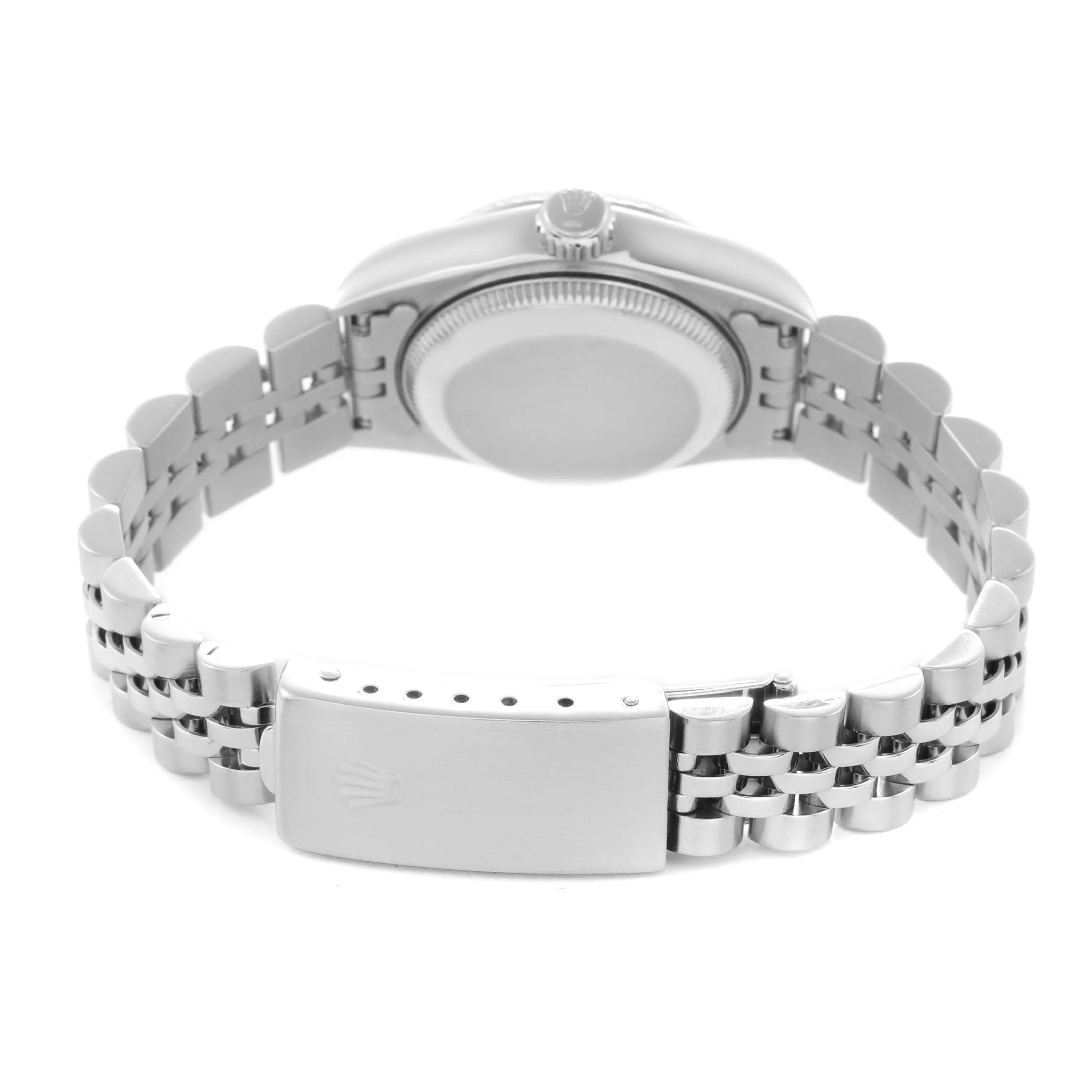 The Rolex Datejust 69174 Women
s Stainless Steel Silver Dial 69174 Women
s Stainless Steel Silver Dial watch is shown from the rear, highlighting the bracelet and clasp.