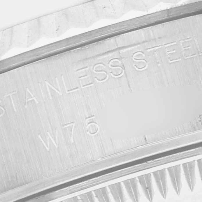 The image shows a close-up of the side engraving on a Rolex Datejust 69174 Women
s Stainless Steel Silver Dial 69174 Women
s Stainless Steel Silver Dial, highlighting the stainless steel marking.