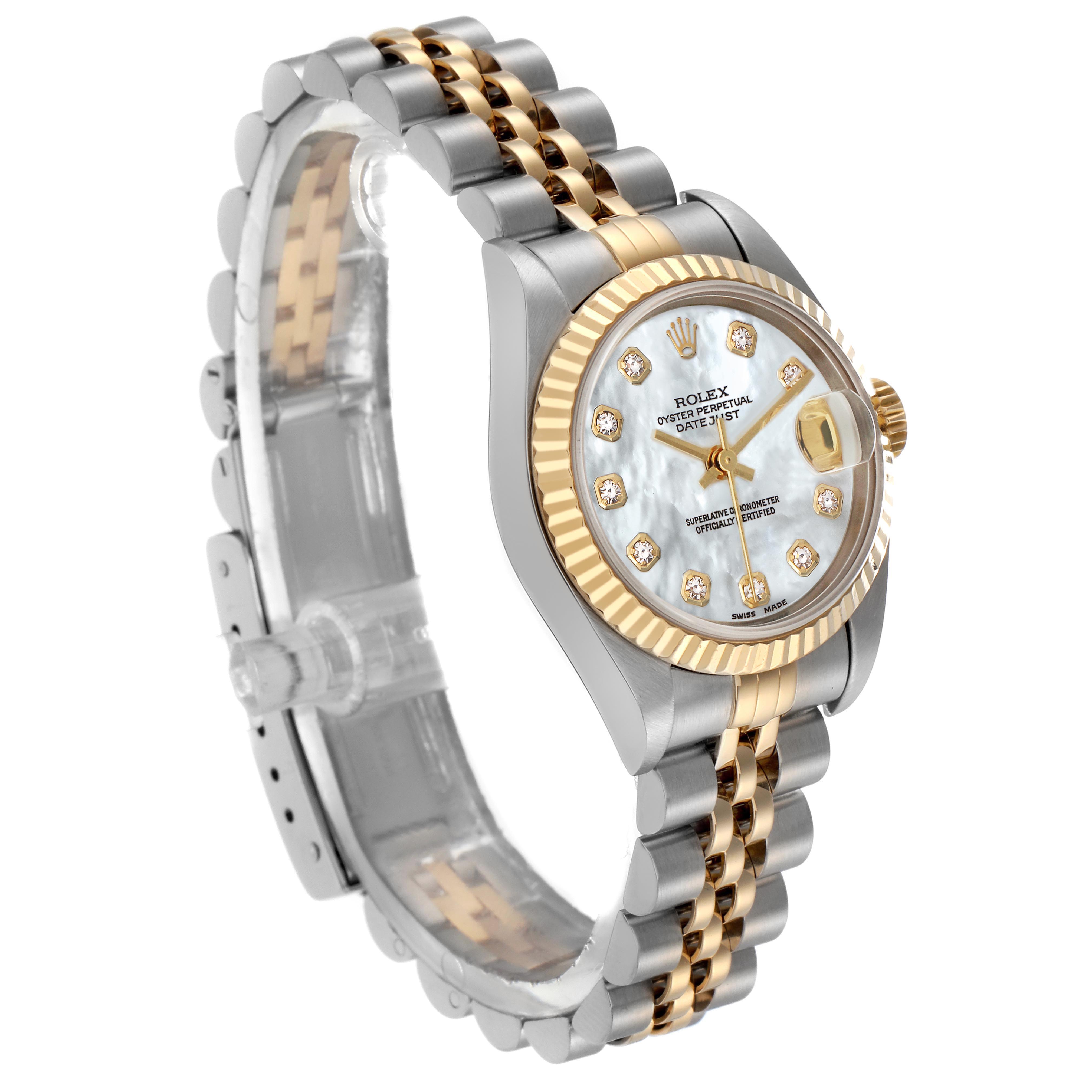 The Rolex Datejust 79173 Women
s Steel and Gold (two tone) Mother of Pearl Dial 79173 Women
s Steel and Gold (two tone) Mother of Pearl Dial watch is shown at a three-quarter angle, highlighting the face, fluted bezel, and two-tone bracelet.