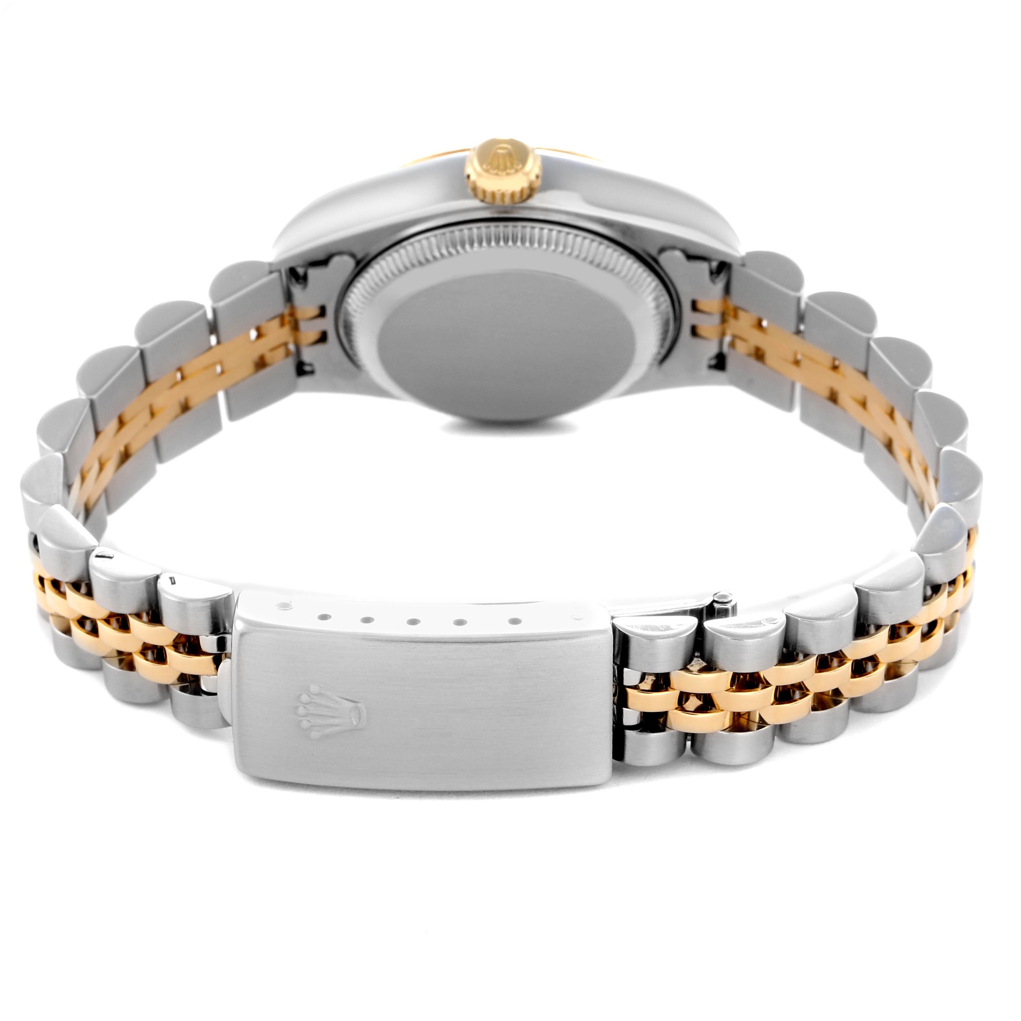 The image shows the Rolex Datejust 79173 Women
s Steel and Gold (two tone) Mother of Pearl Dial 79173 Women
s Steel and Gold (two tone) Mother of Pearl Dial watch from the back, highlighting the clasp, jubilee bracelet, and case.