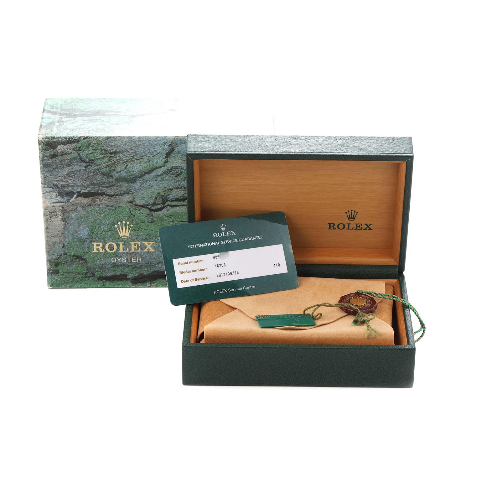 The image shows a Rolex Datejust 16203 Men
s Steel and Gold (two tone) Grey Dial 16203 Men
s Steel and Gold (two tone) Grey Dial watch box, including paperwork and tags, viewed from the front.