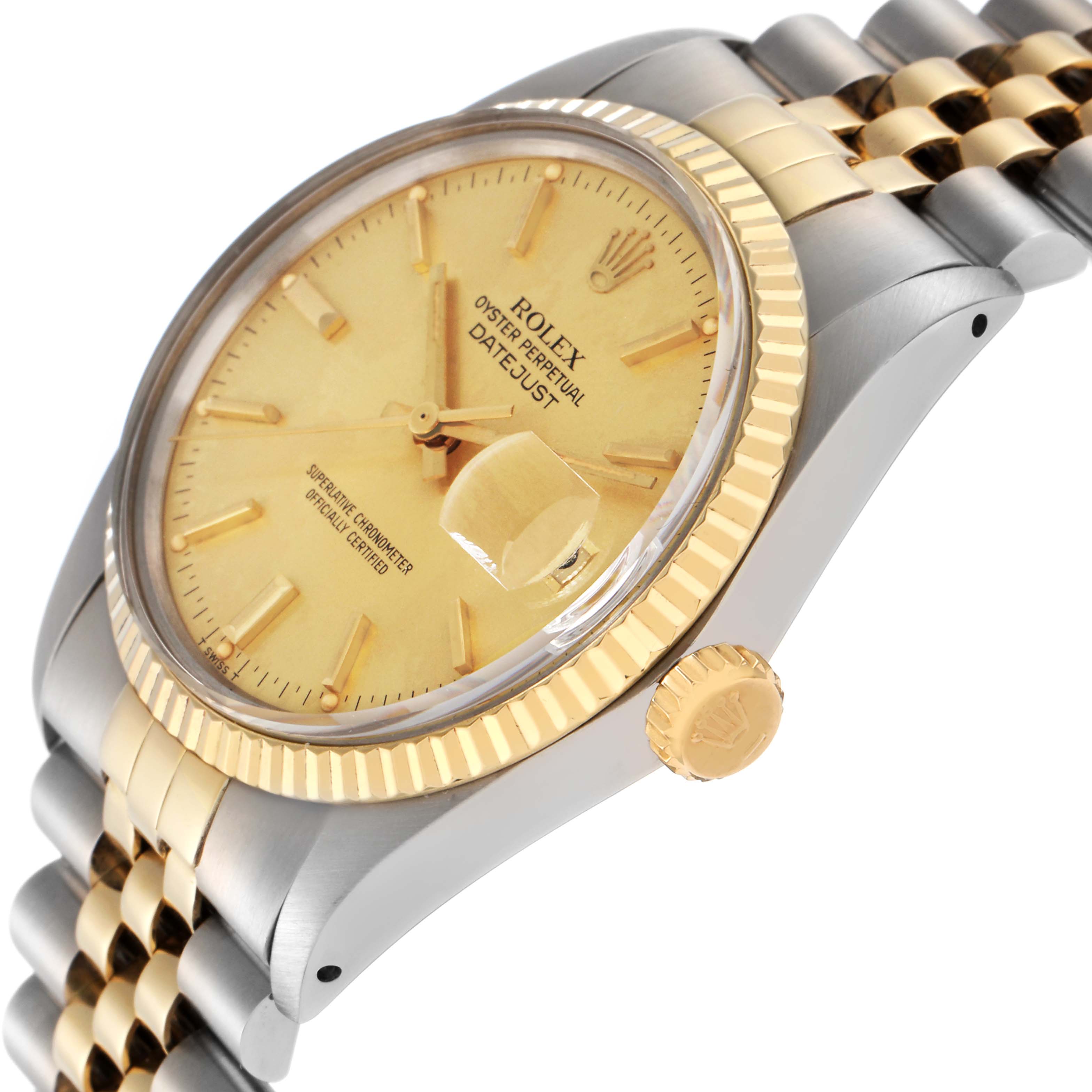 The Rolex Datejust 16013 Men
s Steel and Gold (two tone) Champagne Dial 16013 Men
s Steel and Gold (two tone) Champagne Dial watch is shown at a right-side angle, highlighting its gold-toned dial, bezel, and crown, and the two-tone bracelet.