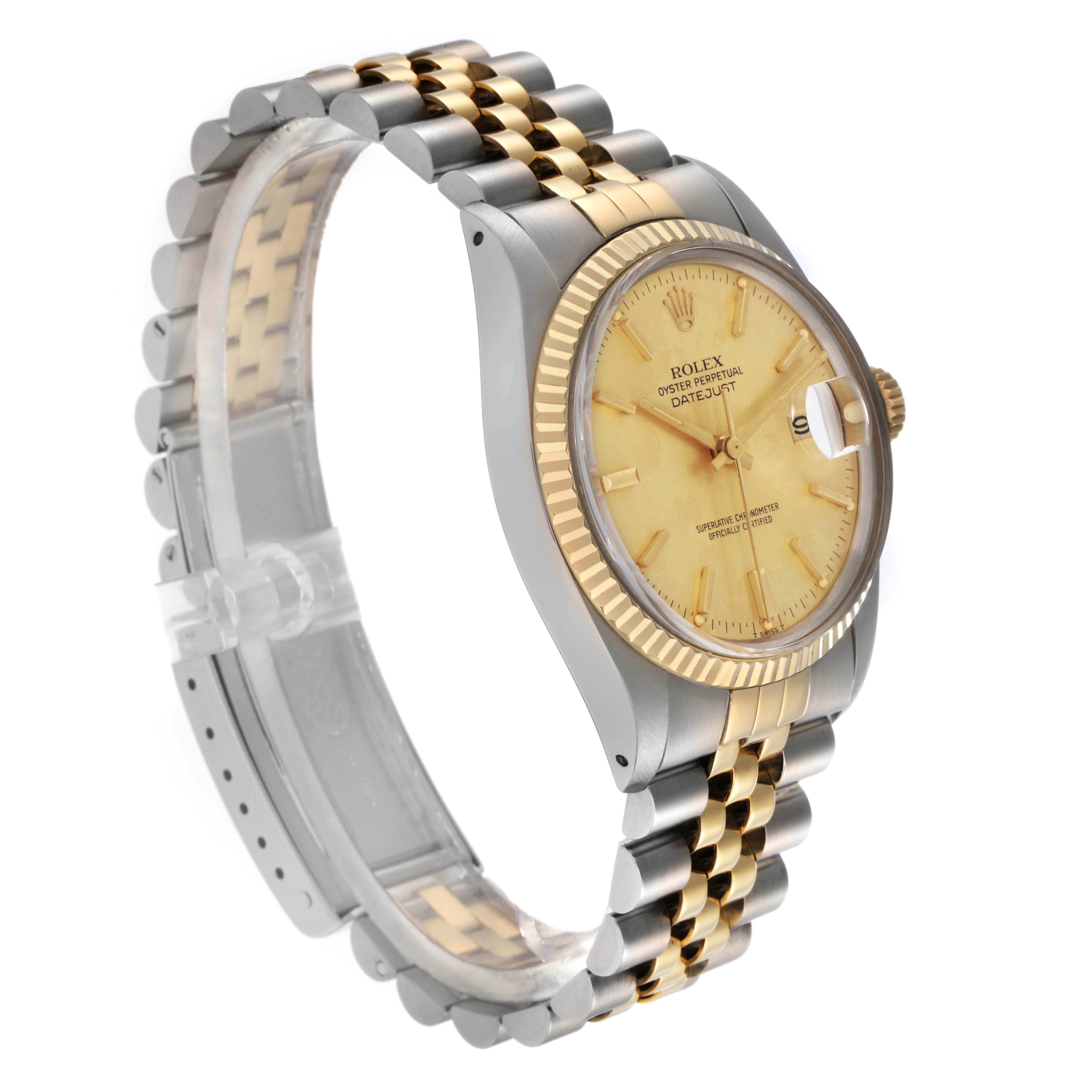 The Rolex Datejust 16013 Men
s Steel and Gold (two tone) Champagne Dial 16013 Men
s Steel and Gold (two tone) Champagne Dial watch is shown at a side angle, featuring the bezel, case, dial, and two-tone bracelet.
