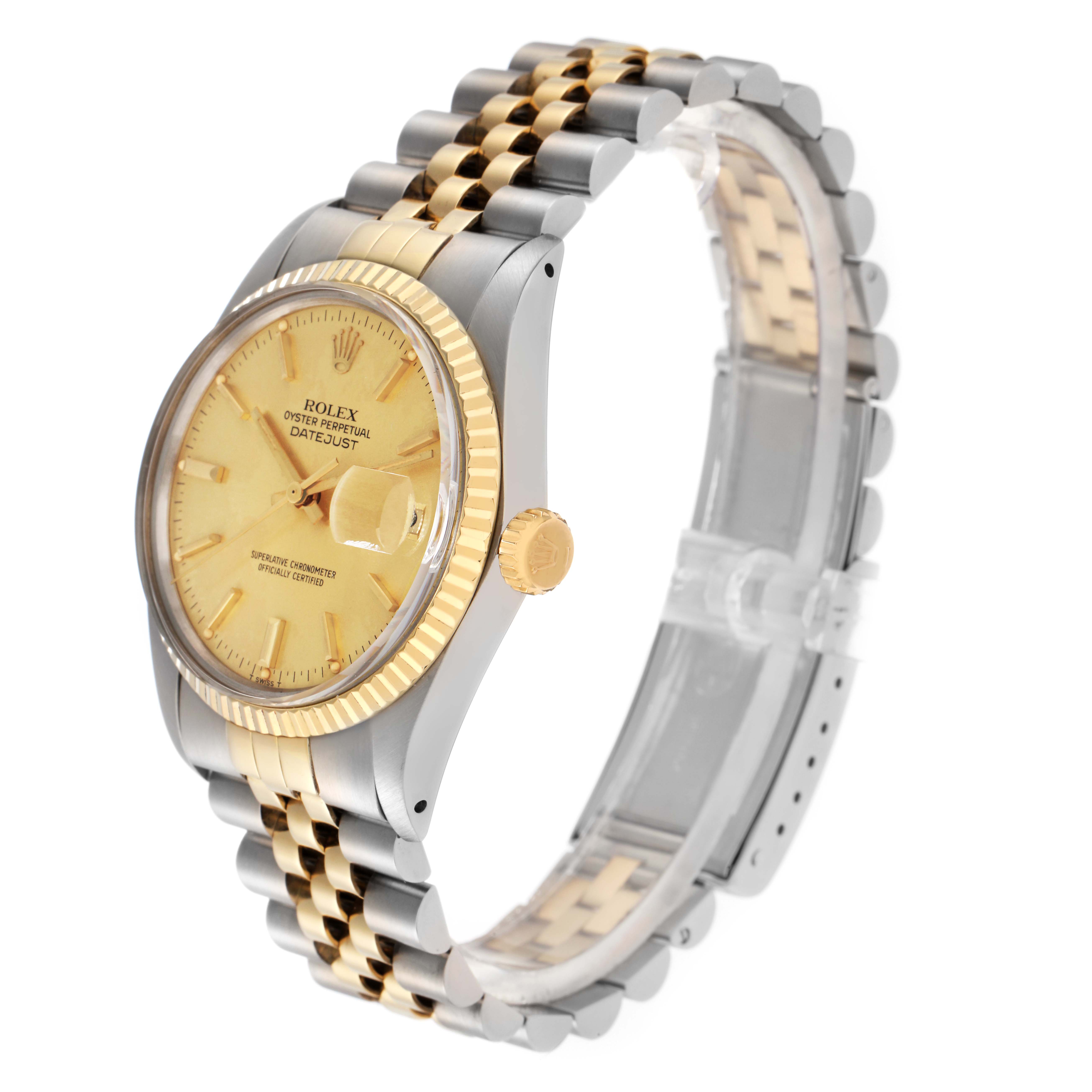 The Rolex Datejust 16013 Men
s Steel and Gold (two tone) Champagne Dial 16013 Men
s Steel and Gold (two tone) Champagne Dial watch is shown at an angled side view, highlighting the gold-tone bezel, dial, crown, and two-tone bracelet.