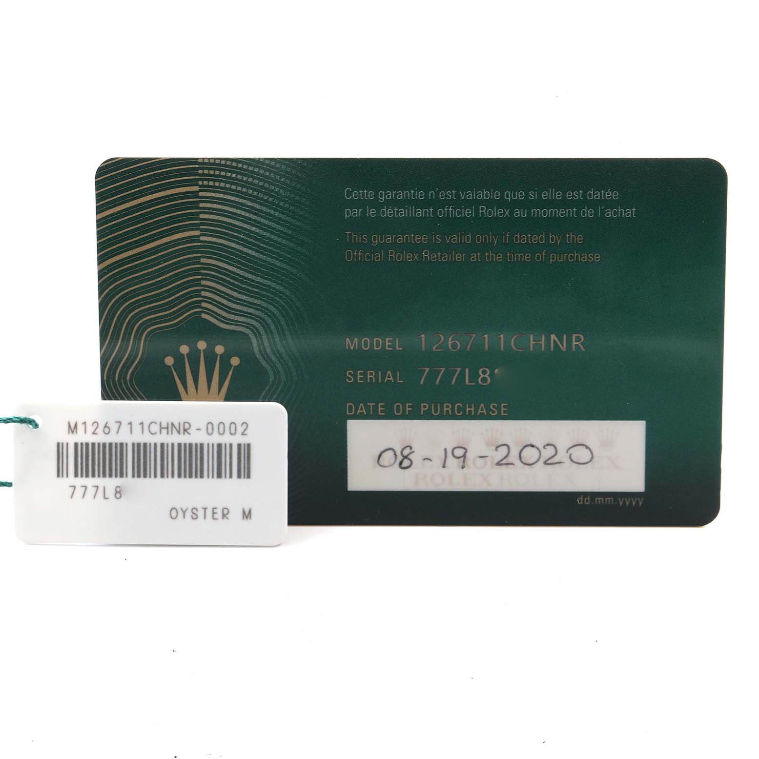 The image shows the warranty card and tag for a Rolex GMT-Master 126711 Men
s Steel and Gold (two tone) Black Dial 126711 Men
s Steel and Gold (two tone) Black Dial, model 126711CHNR.