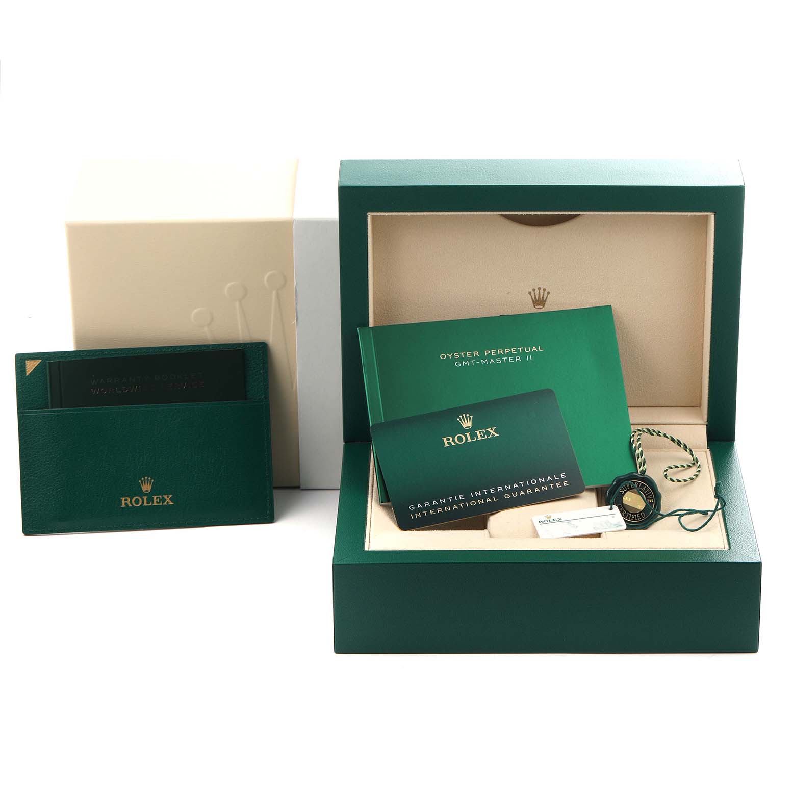 The image shows the packaging and accessories for a Rolex GMT-Master 126711 Men
s Steel and Gold (two tone) Black Dial 126711 Men
s Steel and Gold (two tone) Black Dial, including the box, manuals, and a warranty card.