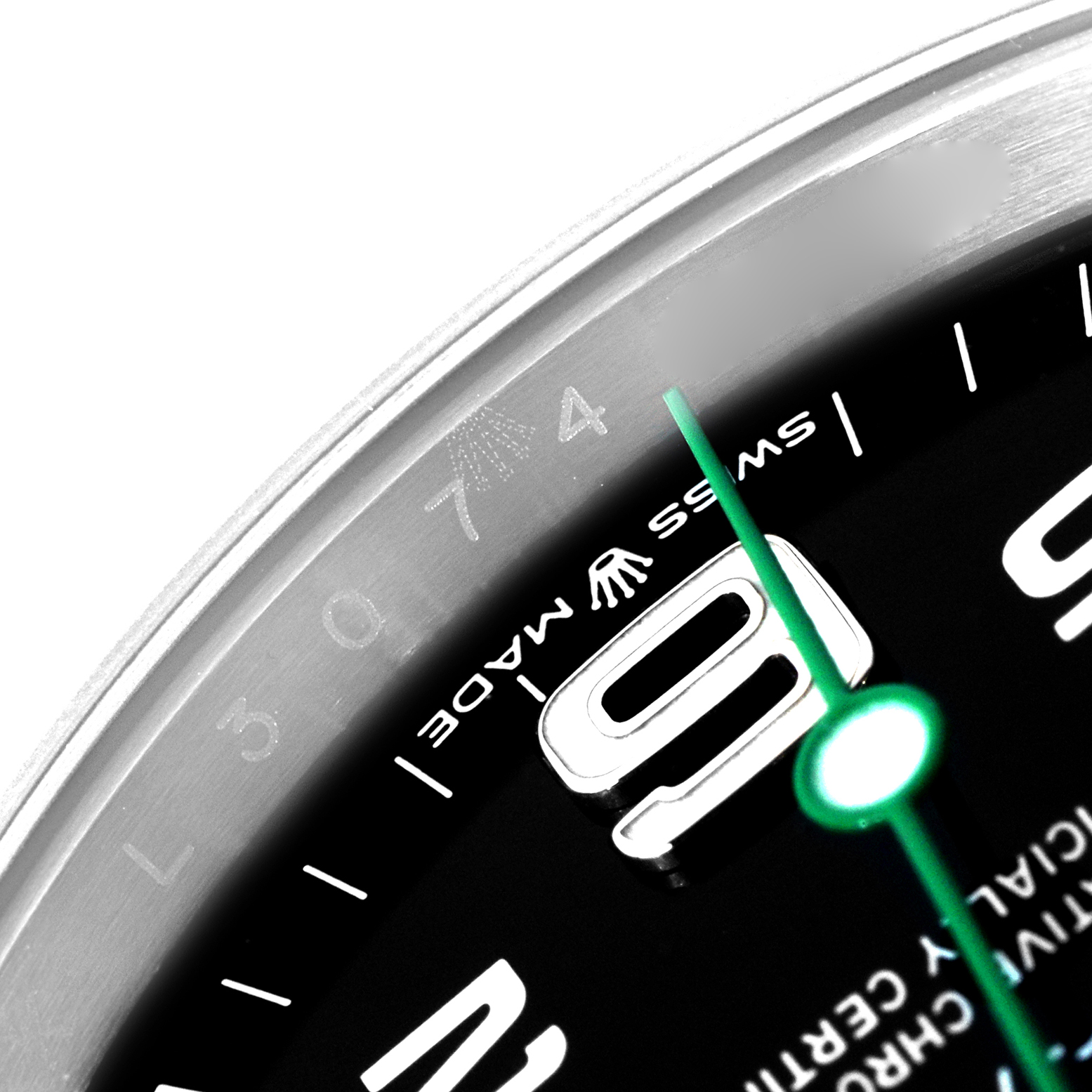 The image shows a close-up of the dial and the rehaut of the Rolex Air-King 126900 Men's Stainless Steel Black Dial watch, focusing on the number "9" and part of the minute hand.