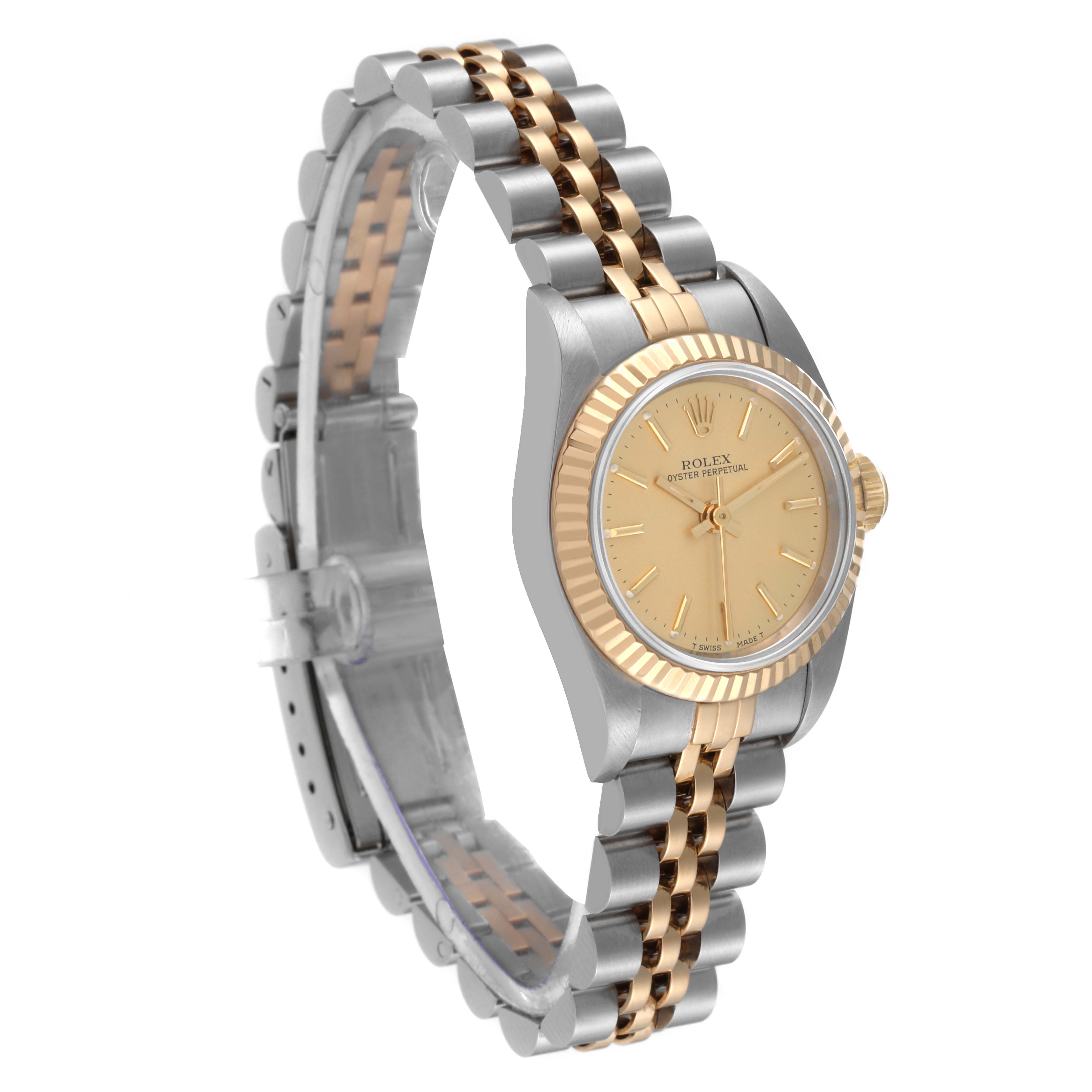 The Rolex Oyster Perpetual 67193 Women's Steel and Gold (two tone) Champagne Dial 67193 Women's Steel and Gold (two tone) Champagne Dial watch is shown at an angle highlighting the face, bezel, and two-tone bracelet.