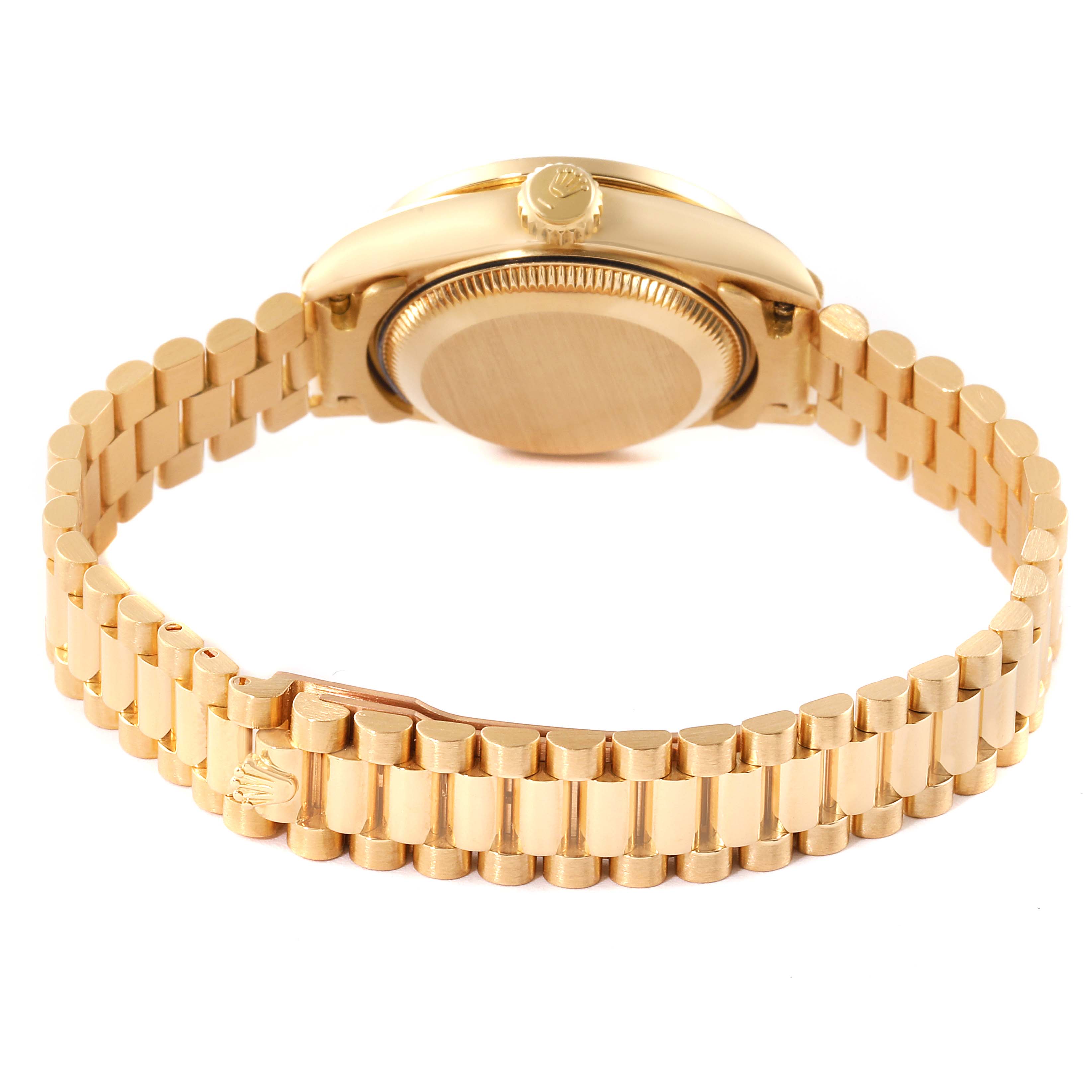 This image shows the Rolex President 69068 Women
s Yellow Gold Champagne Dial 69068 Women
s Yellow Gold Champagne Dial model watch from the back, highlighting its gold case and band.