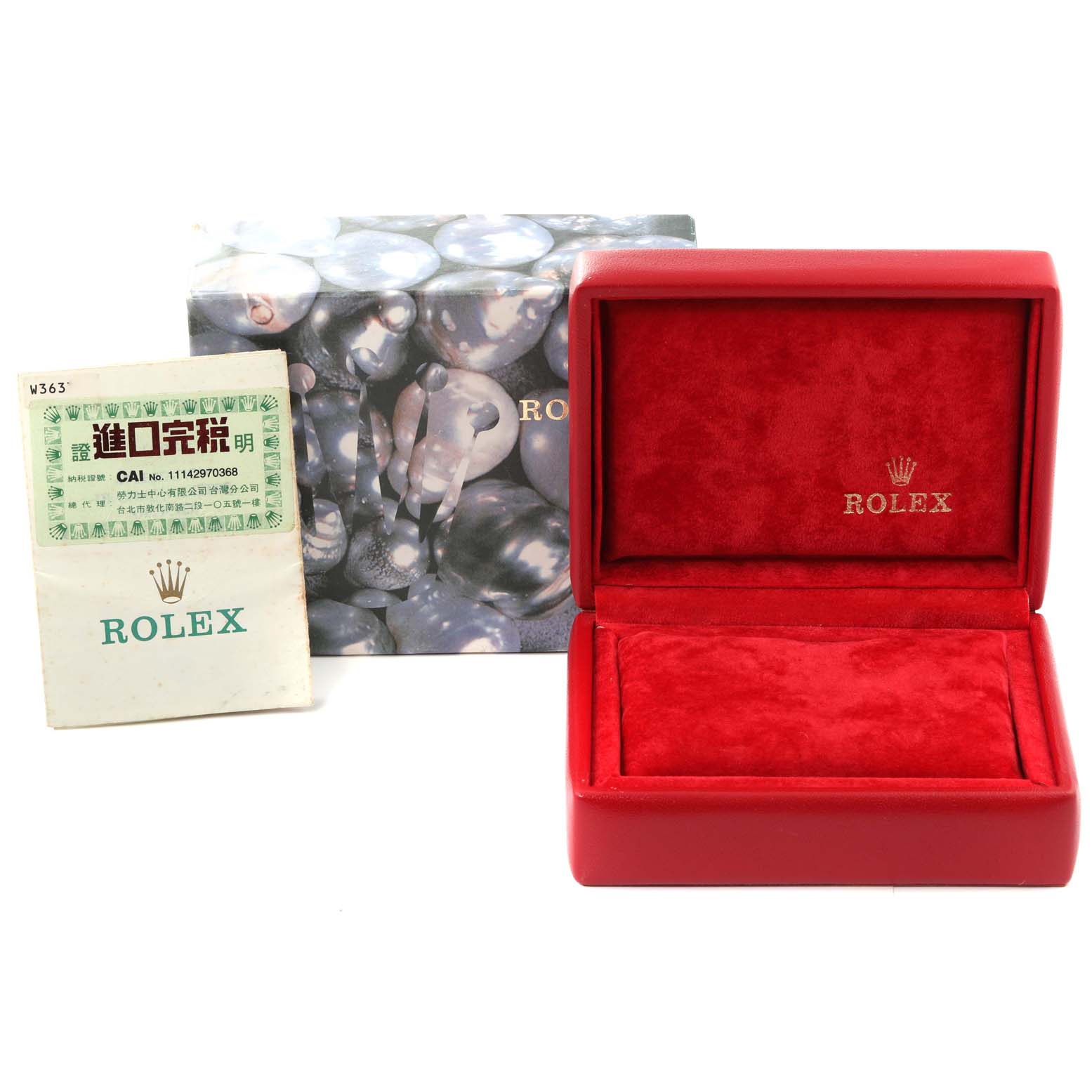 This image shows the packaging and accessories for a Rolex President 69068 Women
s Yellow Gold Champagne Dial 69068 Women
s Yellow Gold Champagne Dial model, including the box, watch case, and documentation.