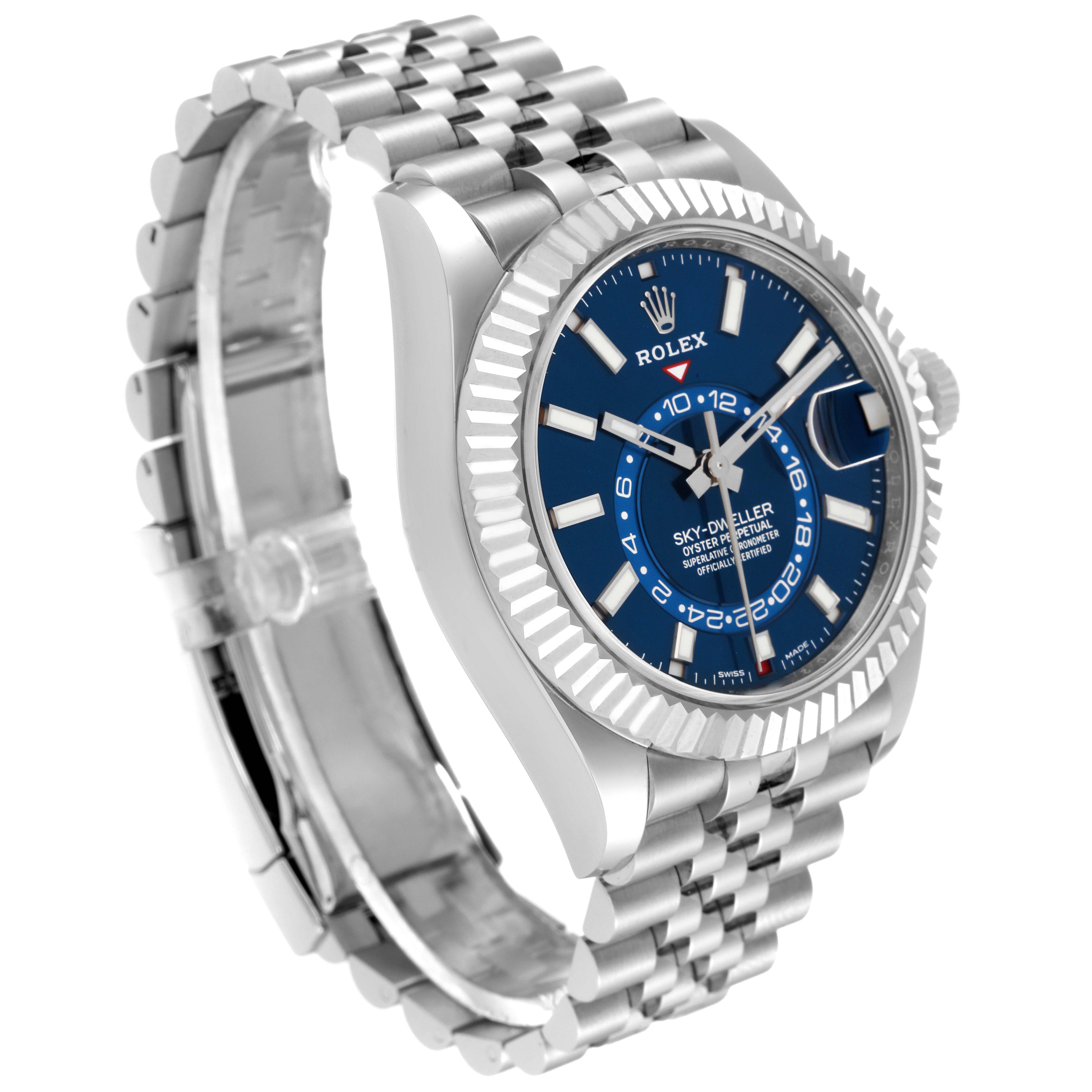 This image shows the Rolex Sky-Dweller 326934 Men
s Stainless Steel Blue Dial 326934 Men
s Stainless Steel Blue Dial watch from an oblique angle, highlighting its blue dial, fluted bezel, and stainless steel bracelet.