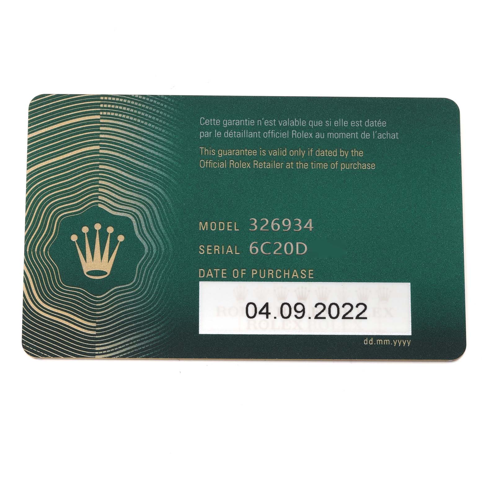 The image shows a Rolex Sky-Dweller 326934 Men
s Stainless Steel Blue Dial 326934 Men
s Stainless Steel Blue Dial warranty card laying flat, displaying the model number, serial number, and date of purchase.