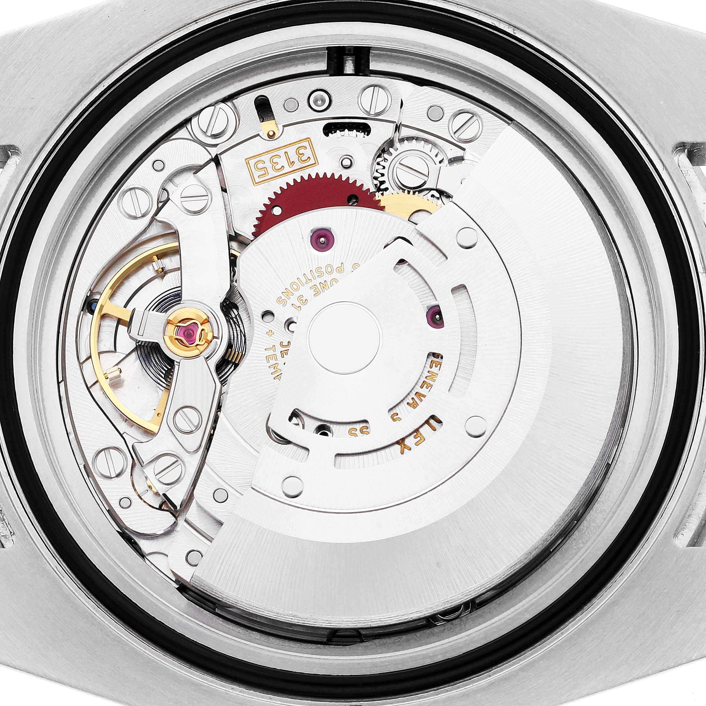 This image shows a close-up of the movement mechanism of a Rolex Submariner 116610 Men
s Stainless Steel Black Dial 116610 Men
s Stainless Steel Black Dial watch from the back.