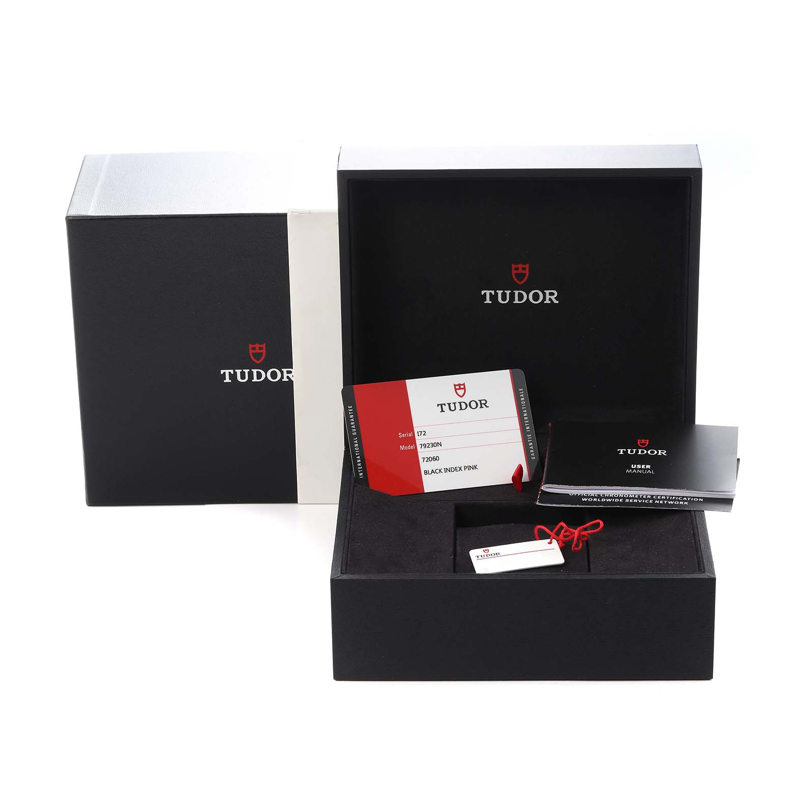 The image shows Tudor Heritage Black Bay M79230N-0002 Men
s Stainless Steel Black Dial M79230N-0002 Men
s Stainless Steel Black Dial packaging with a warranty card, user manual, and box accessories.