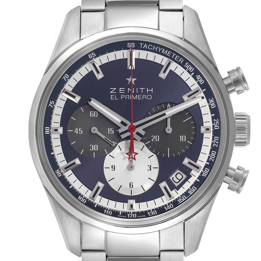 The Zenith Chronomaster watch is shown from a front angle, highlighting the dial, subdials, and tachymeter scale.