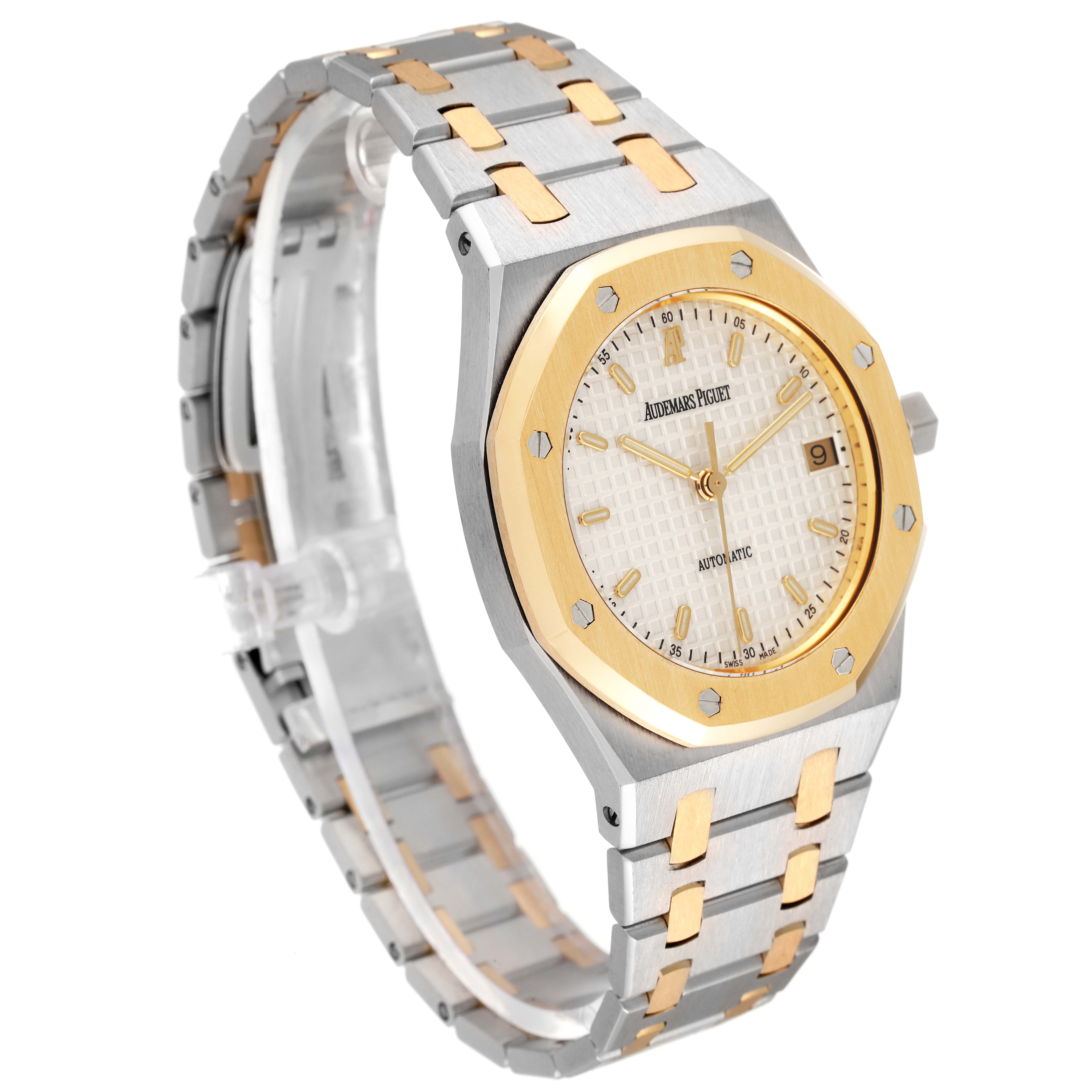 The image shows a side and front angle of an Audemars Piguet Royal Oak 14790SA.OO.0789SA.08 Men's Steel and Gold (two tone) Silver Dial 14790SA.OO.0789SA.08 Men's Steel and Gold (two tone) Silver Dial watch, highlighting its dial, bezel, and bracelet.