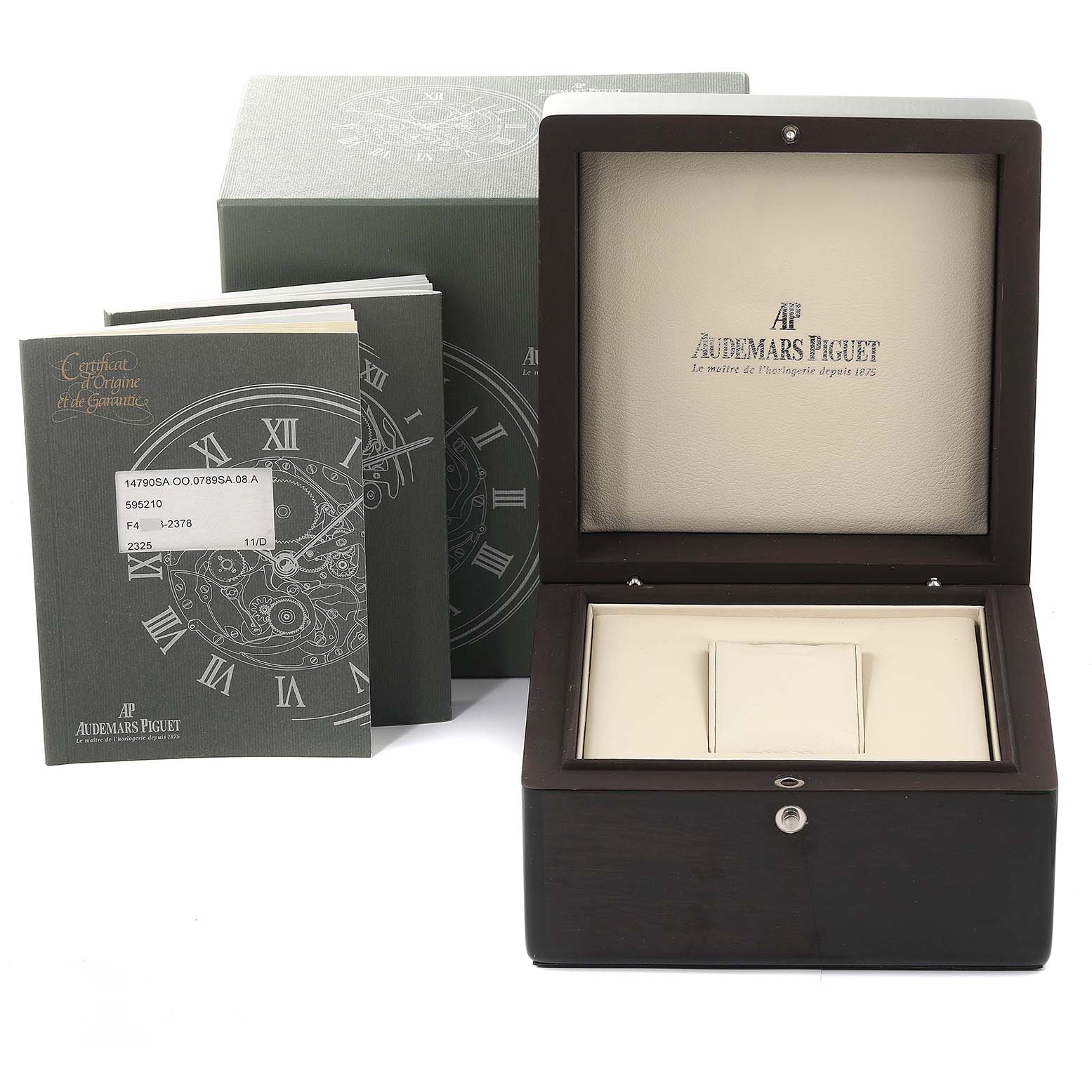 The image shows an open presentation box and manuals for the Royal Oak model by Audemars Piguet seen from a front angle.
