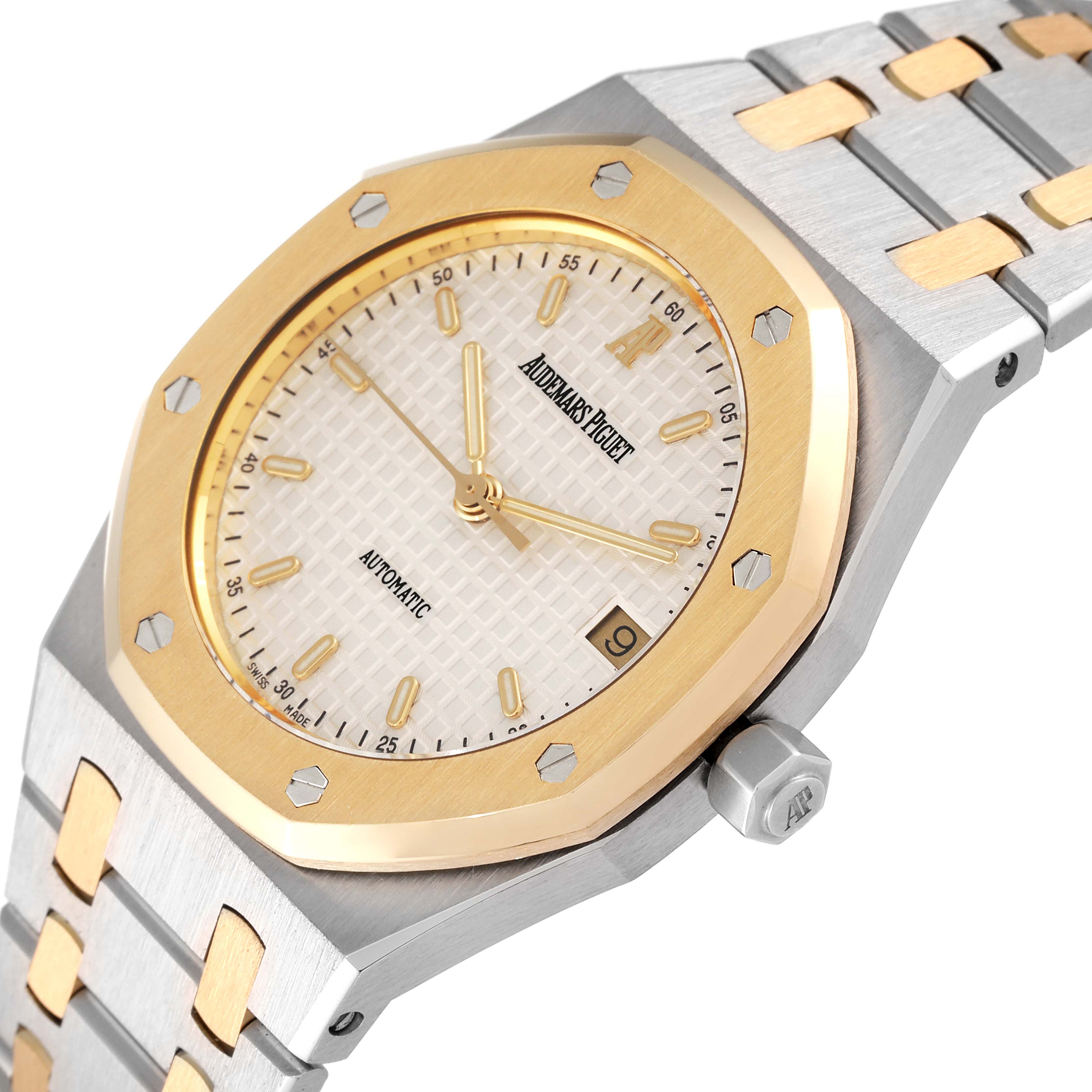 This image shows a close-up of the Audemars Piguet Royal Oak 14790SA.OO.0789SA.08 Men's Steel and Gold (two tone) Silver Dial 14790SA.OO.0789SA.08 Men's Steel and Gold (two tone) Silver Dial watch, highlighting the dial, bezel, and part of the strap.