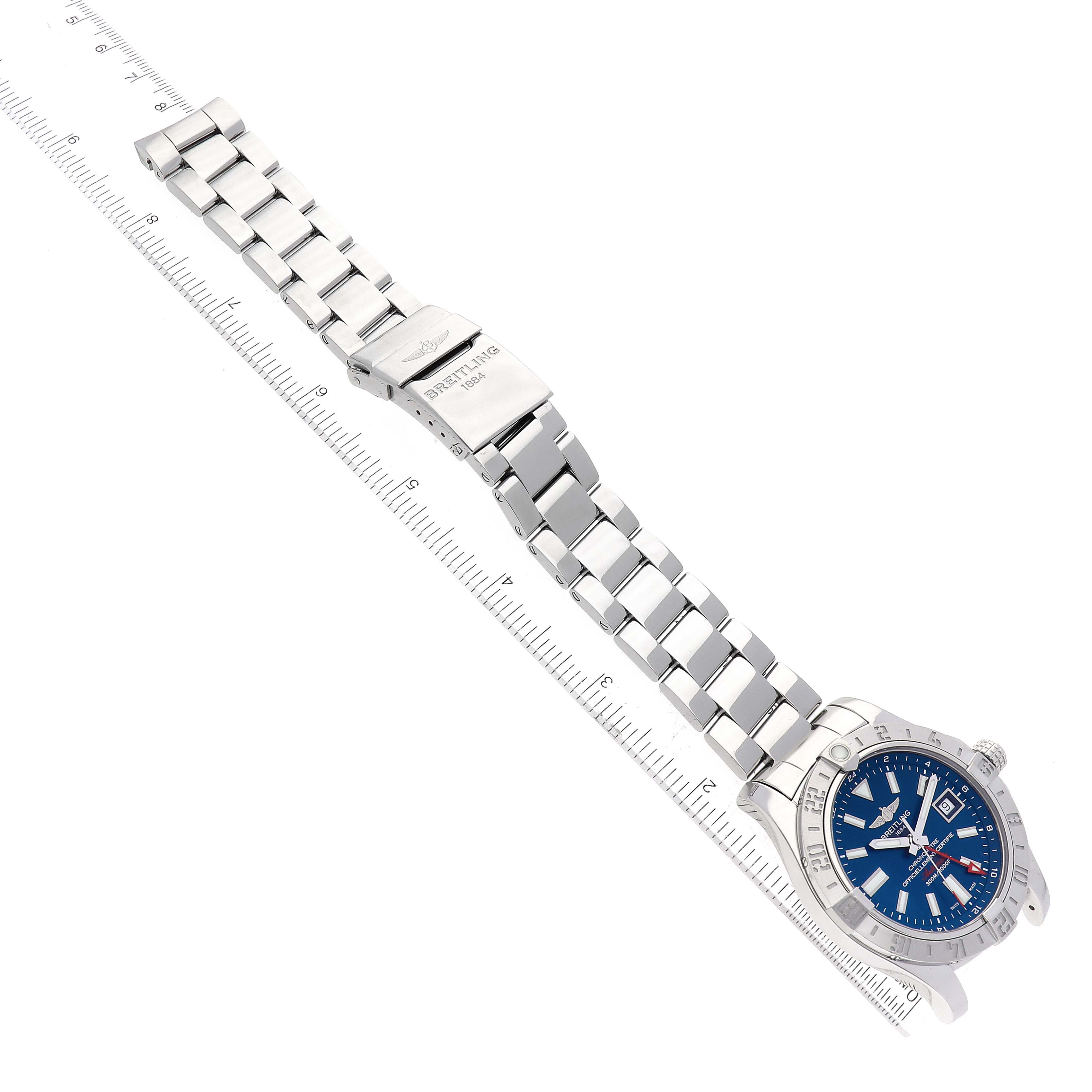 The Breitling Avenger A3239011/C872 Men's Stainless Steel Blue Dial A3239011/C872 Men's Stainless Steel Blue Dial watch is shown flat, displaying the full silver bracelet, clasp, and blue face at an angle.