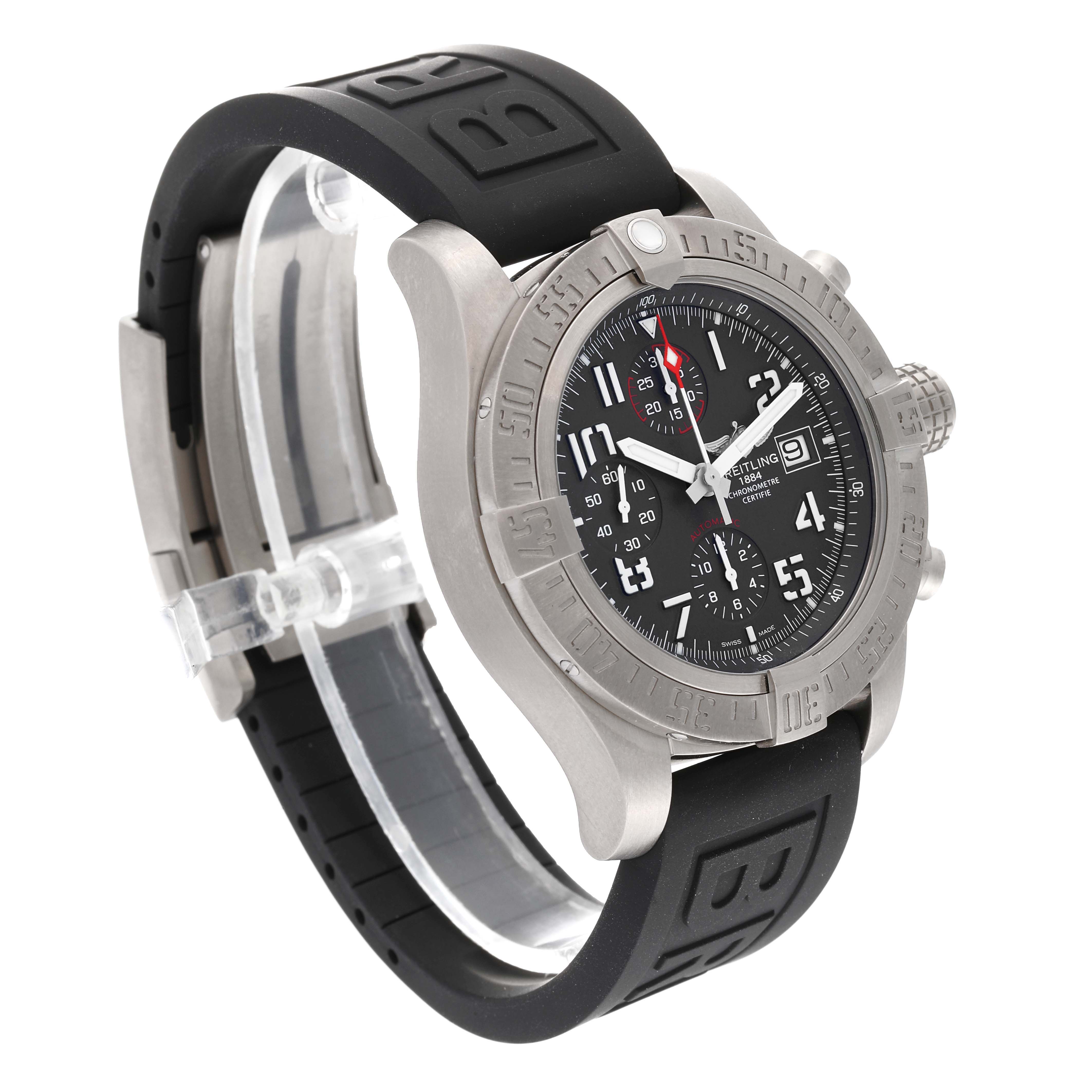 The image shows a side angle view of the Breitling Avenger E13383 Men's Titanium Grey Dial E13383 Men's Titanium Grey Dial model, highlighting the watch face, bezel, and black rubber strap.