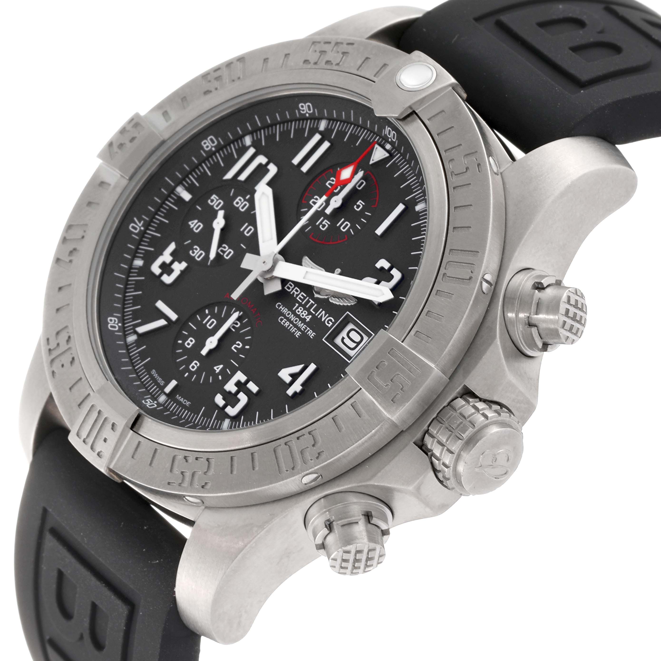 The image shows an angled view of the Breitling Avenger E13383 Men's Titanium Grey Dial E13383 Men's Titanium Grey Dial watch, highlighting the bezel, crown, pushers, and black dial with Arabic numerals.