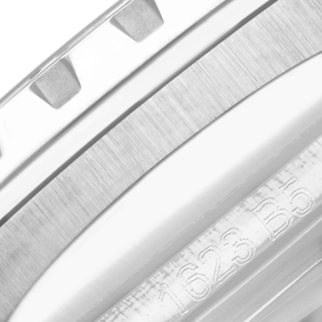 This image shows a close-up of the bezel and part of the case of the Breitling Superocean A17376211C1S1 Men's Stainless Steel Blue Dial A17376211C1S1 Men's Stainless Steel Blue Dial watch.