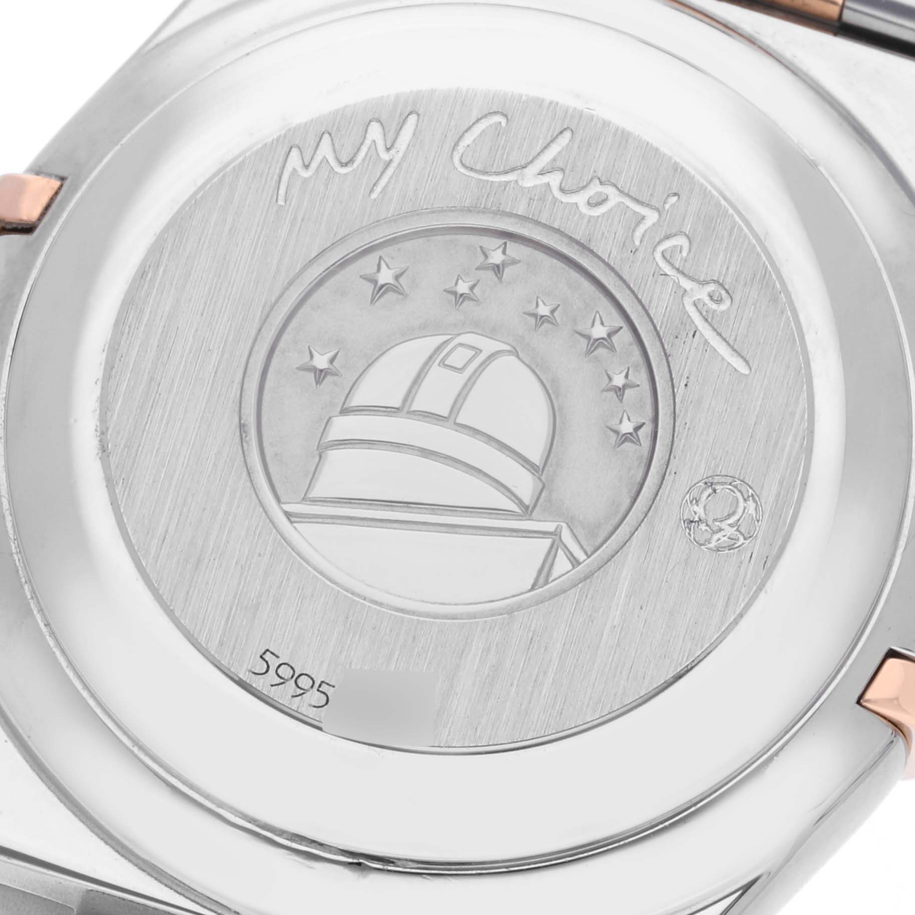 This image shows the back case of the Omega 1394.79.00 Women's Steel and Gold (two tone) Mother of Pearl Dial 1394.79.00 Women's Steel and Gold (two tone) Mother of Pearl Dial Constellation Iris Rainbow Steel Rose Gold Multi Stone Ladies Watch 1394.79.00.