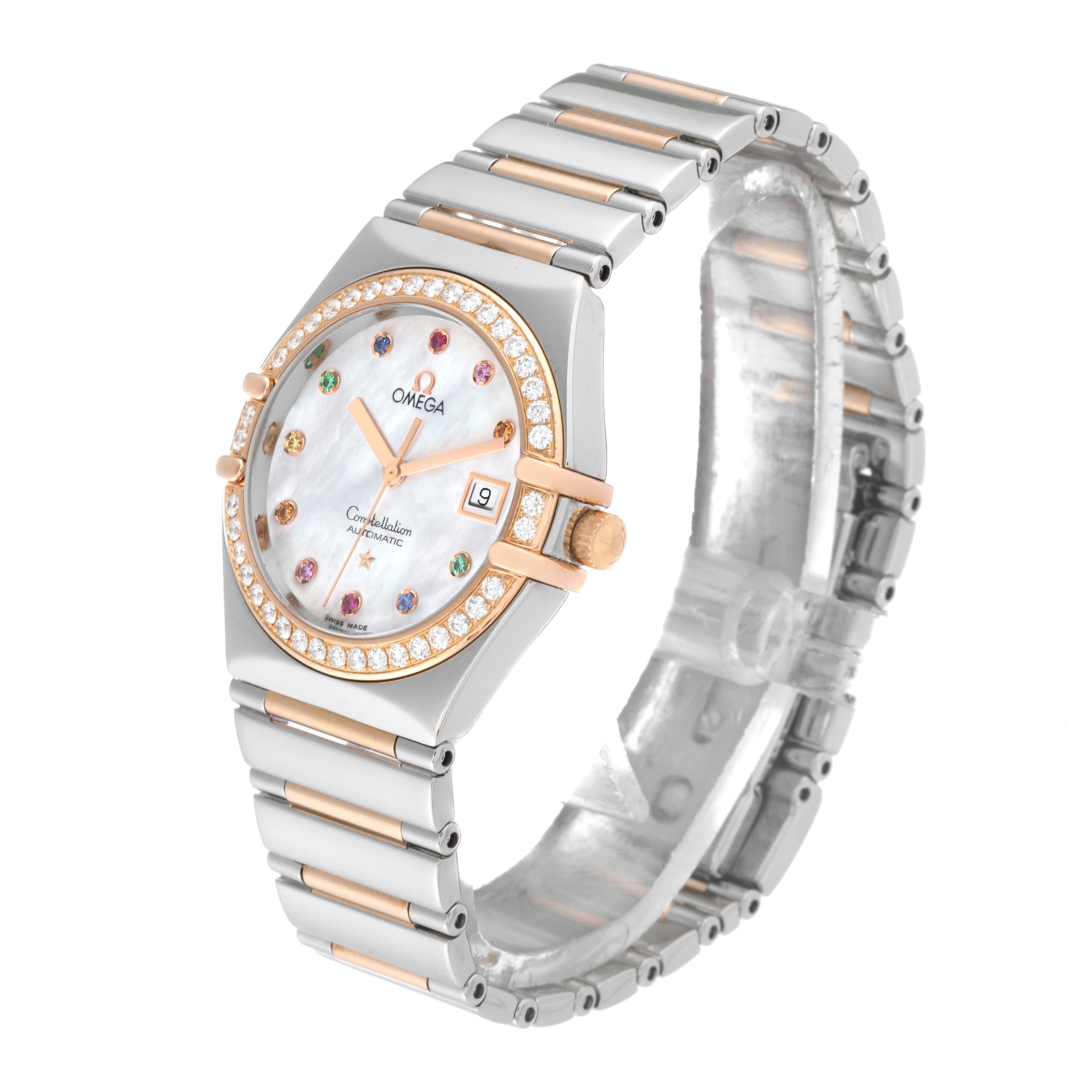 The Omega 1394.79.00 Women's Steel and Gold (two tone) Mother of Pearl Dial 1394.79.00 Women's Steel and Gold (two tone) Mother of Pearl Dial Constellation Iris Rainbow Steel Rose Gold Multi Stone Ladies Watch 1394.79.00 is shown at a slight angle, highlighting its face, bezel, and bracelet.