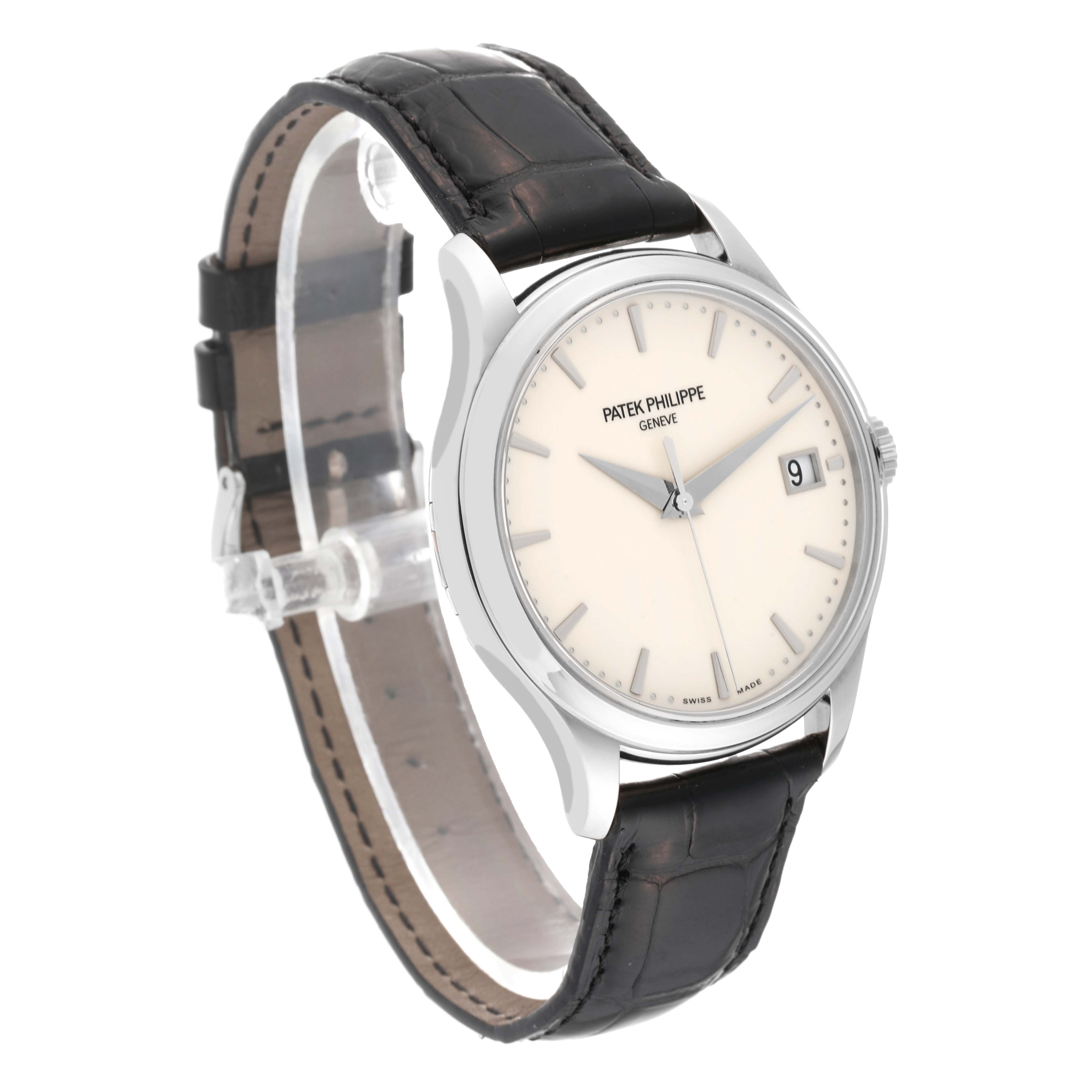 The image shows a Patek Philippe Calatrava 5227G-001 Men's White Gold Beige Dial 5227G-001 Men's White Gold Beige Dial watch at a three-quarter angle, highlighting the face, case, and leather strap.