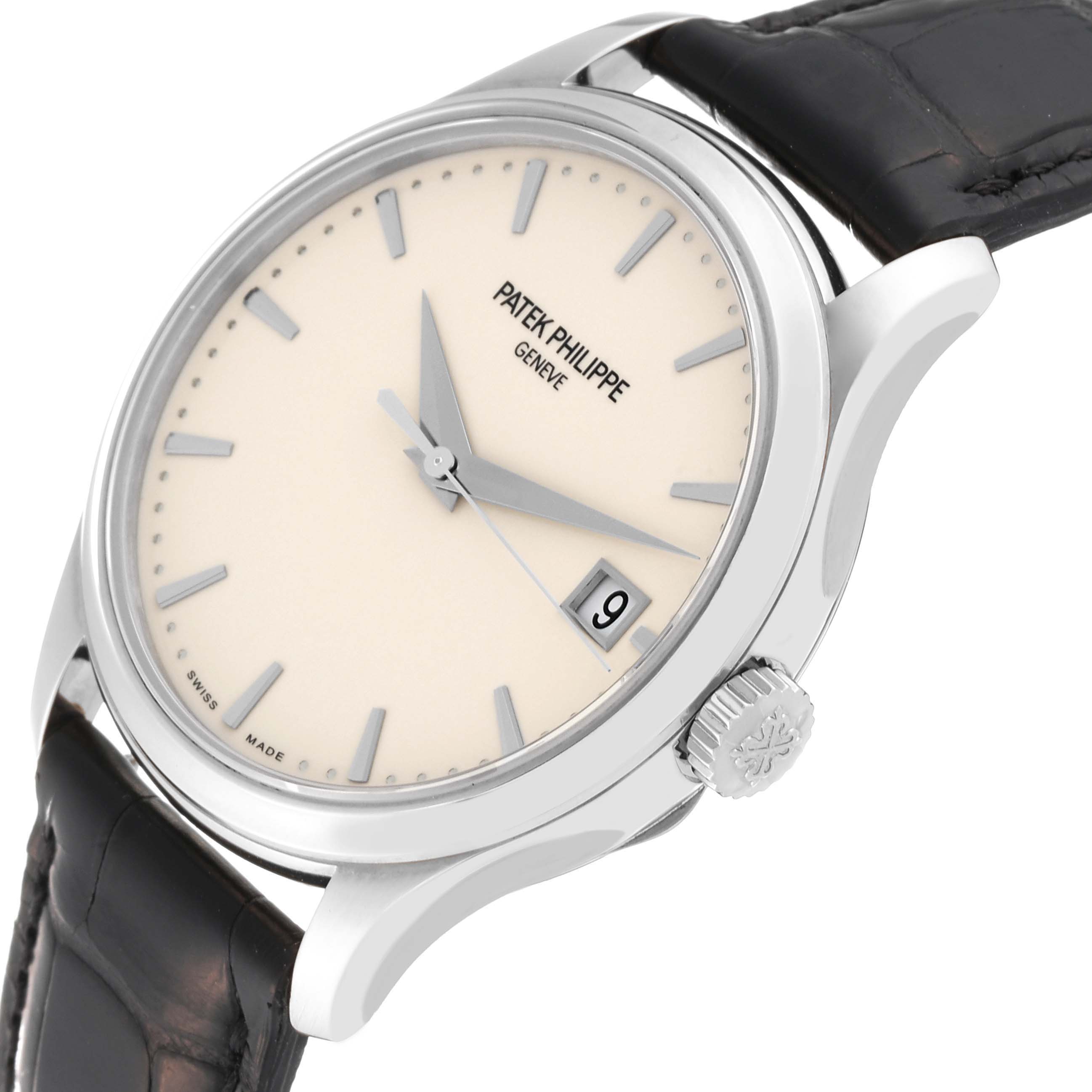 The image shows a Patek Philippe Calatrava 5227G-001 Men's White Gold Beige Dial 5227G-001 Men's White Gold Beige Dial watch at an angled view highlighting the face, crown, and black leather strap.