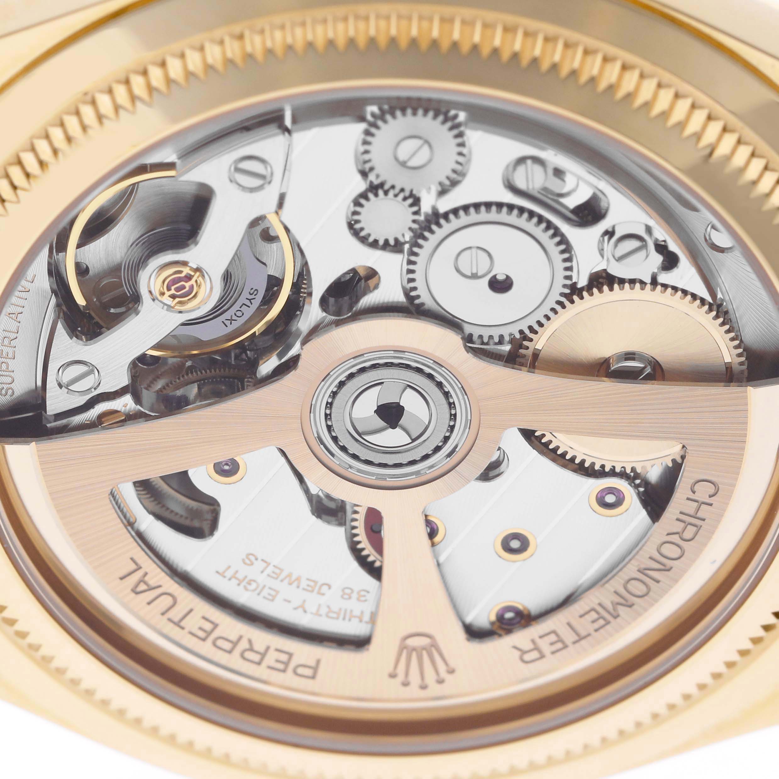 This image shows a close-up of the intricate mechanical movement of a Rolex Cellini model watch.