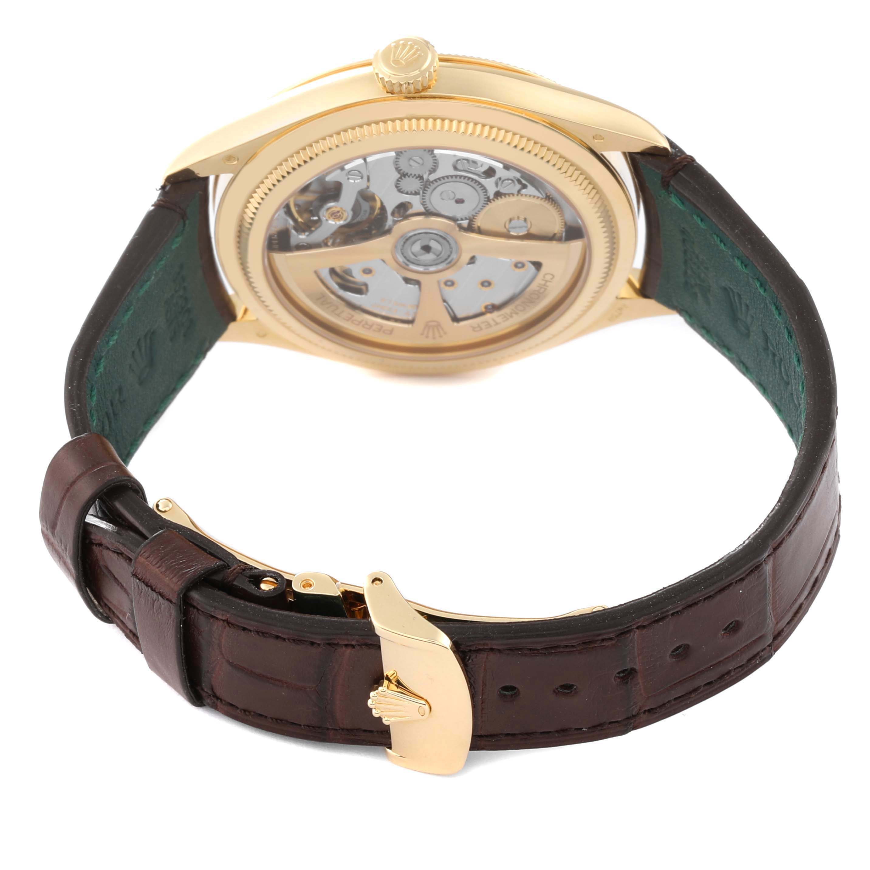 The image shows the back view of a Rolex Cellini watch, highlighting the movement and leather strap.