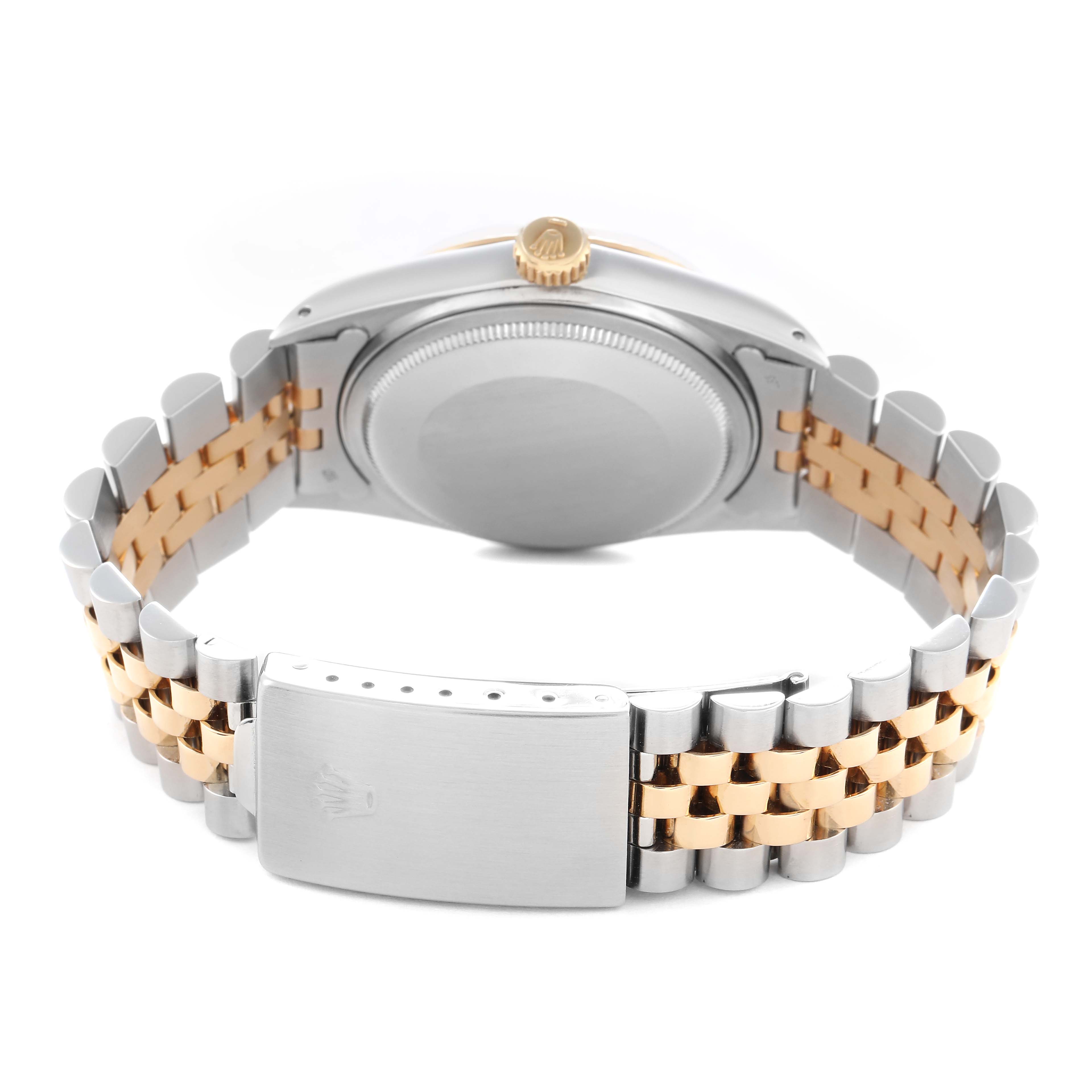 The Rolex Vintage Collection 16013 Men
s Steel and Gold (two tone) Champagne Dial 16013 Men
s Steel and Gold (two tone) Champagne Dial watch is shown from the back, highlighting the case back, crown, and two-tone bracelet with a clasp.