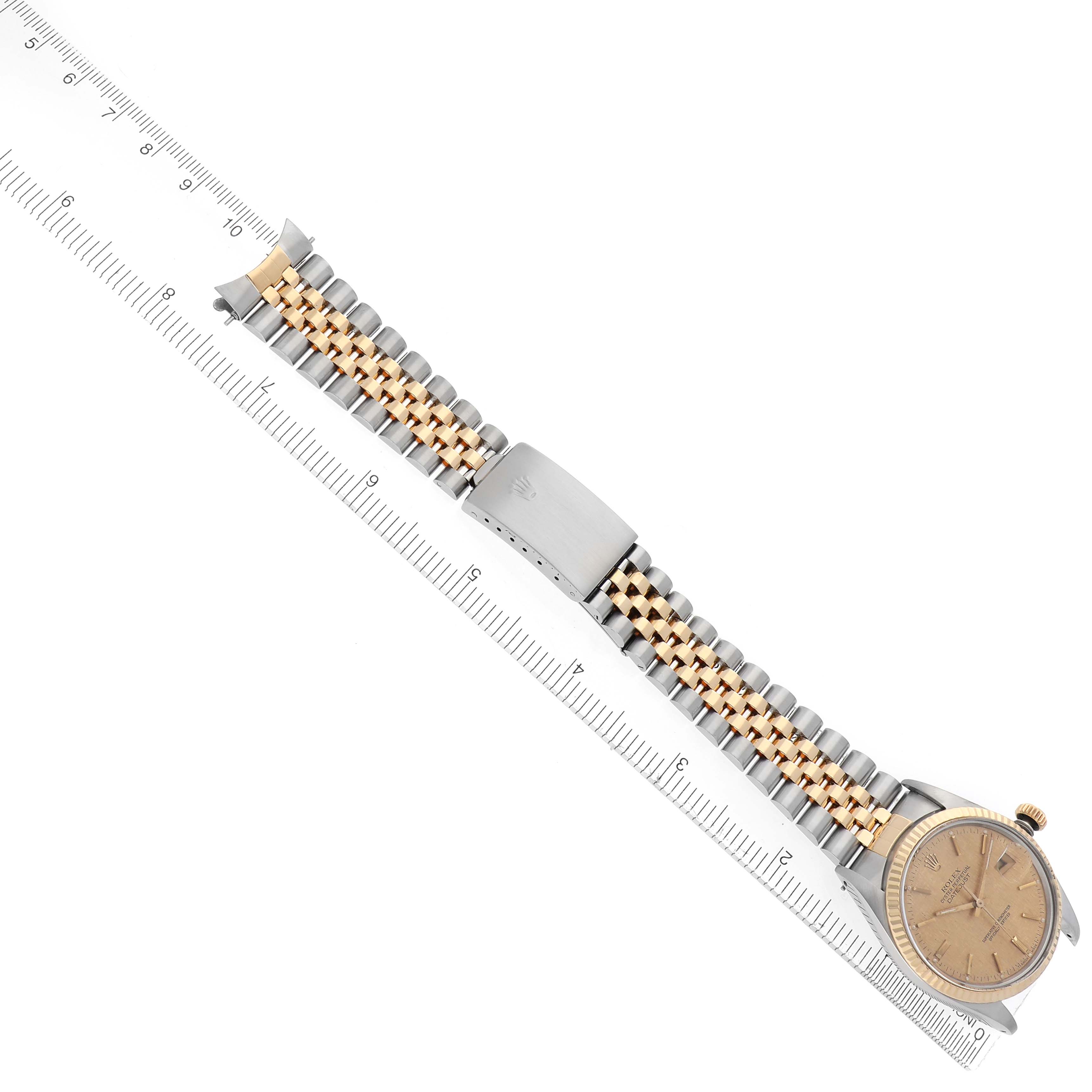 The image shows a Rolex Vintage Collection 16013 Men
s Steel and Gold (two tone) Champagne Dial 16013 Men
s Steel and Gold (two tone) Champagne Dial watch from a top-down angle, highlighting the face, bracelet, and clasp.