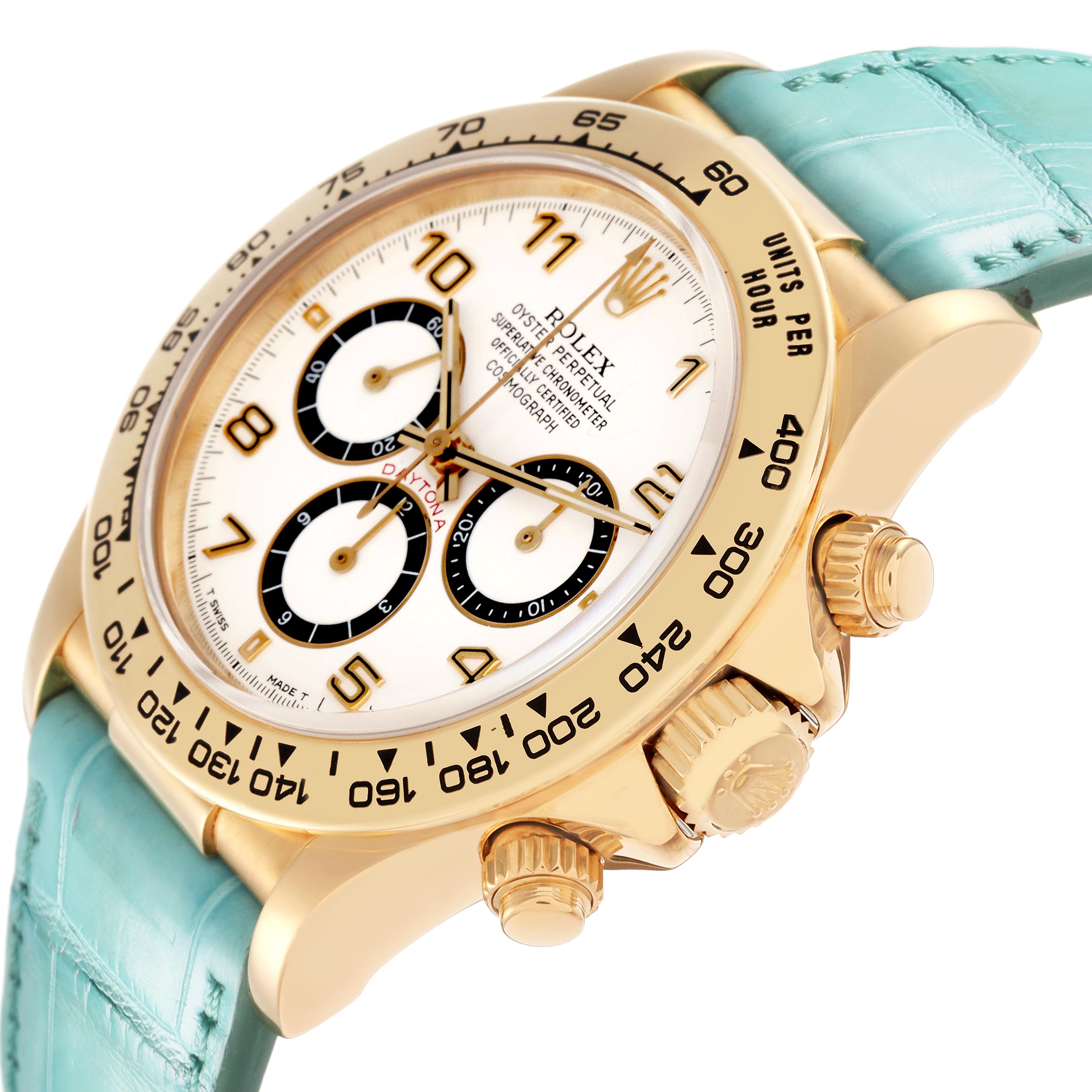 The Rolex Daytona 16518 Men
s Yellow Gold White Dial 16518 Men
s Yellow Gold White Dial watch is shown from a side angle highlighting the dial, tachymetric bezel, crown, and turquoise strap.