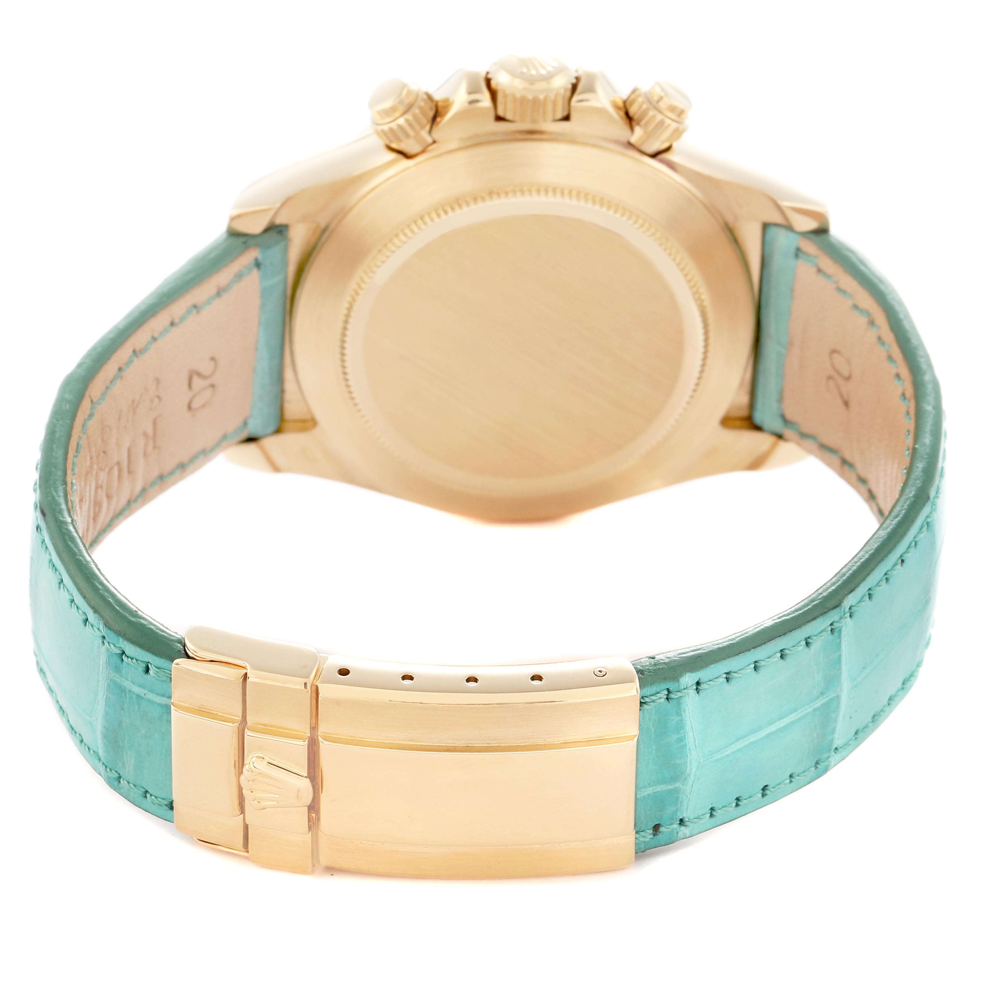 The image shows the back and side view of a Rolex Daytona 16518 Men
s Yellow Gold White Dial 16518 Men
s Yellow Gold White Dial, highlighting the gold case and green leather strap with a clasp.